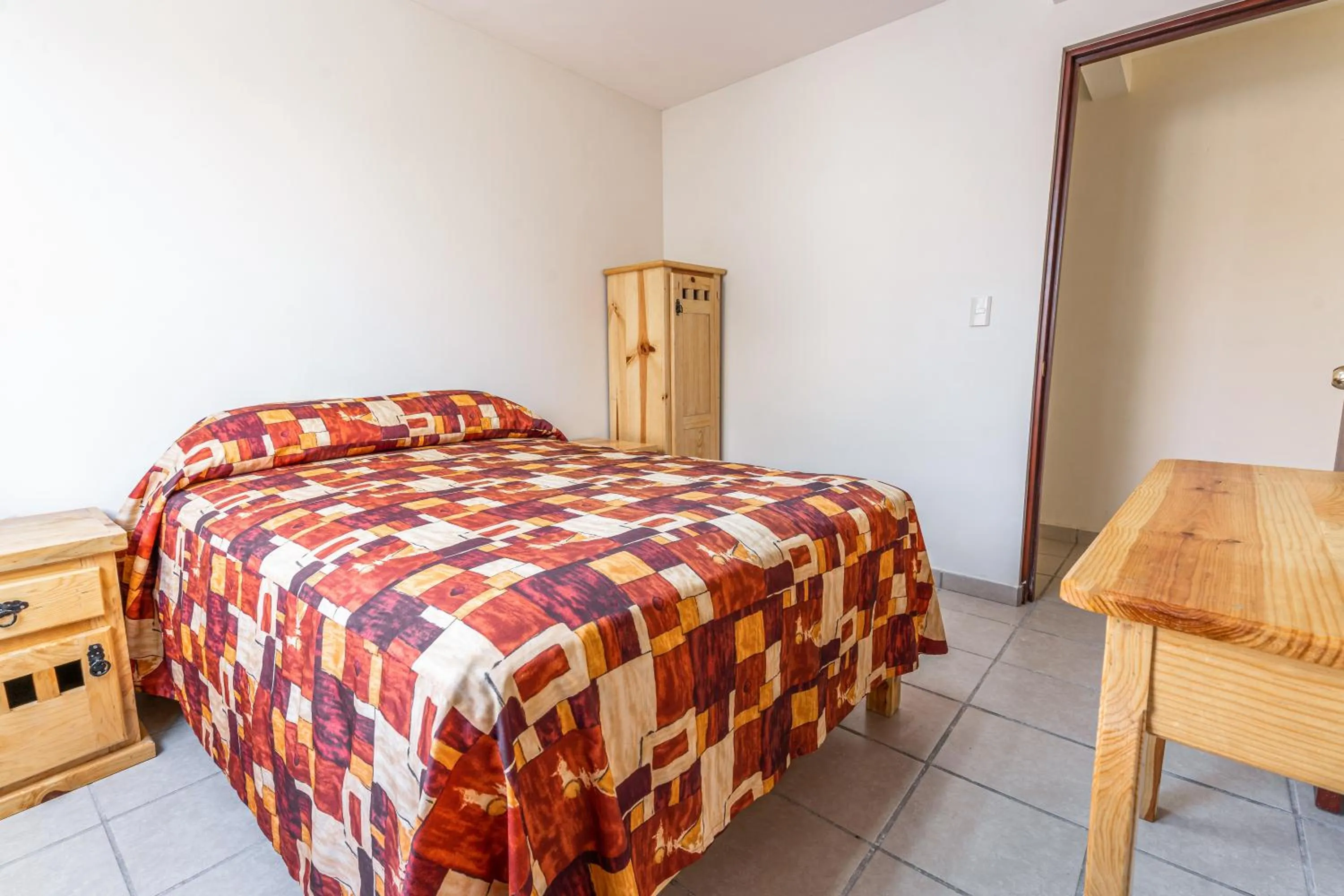 Bed in Cinco de Mayo Hotel