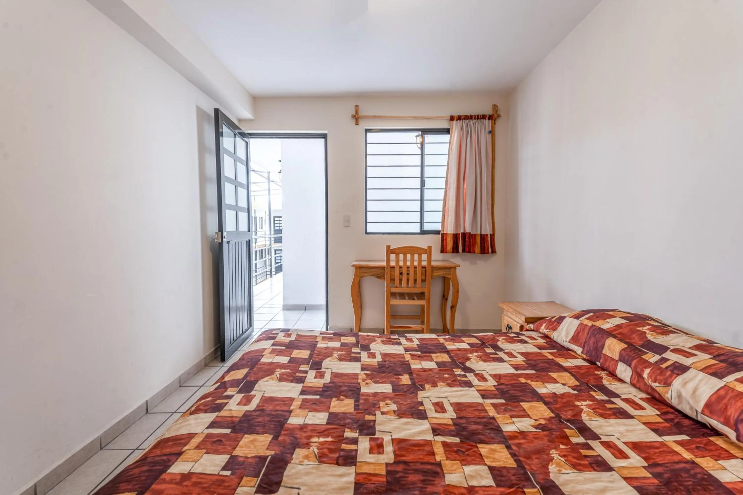 Bed in Cinco de Mayo Hotel