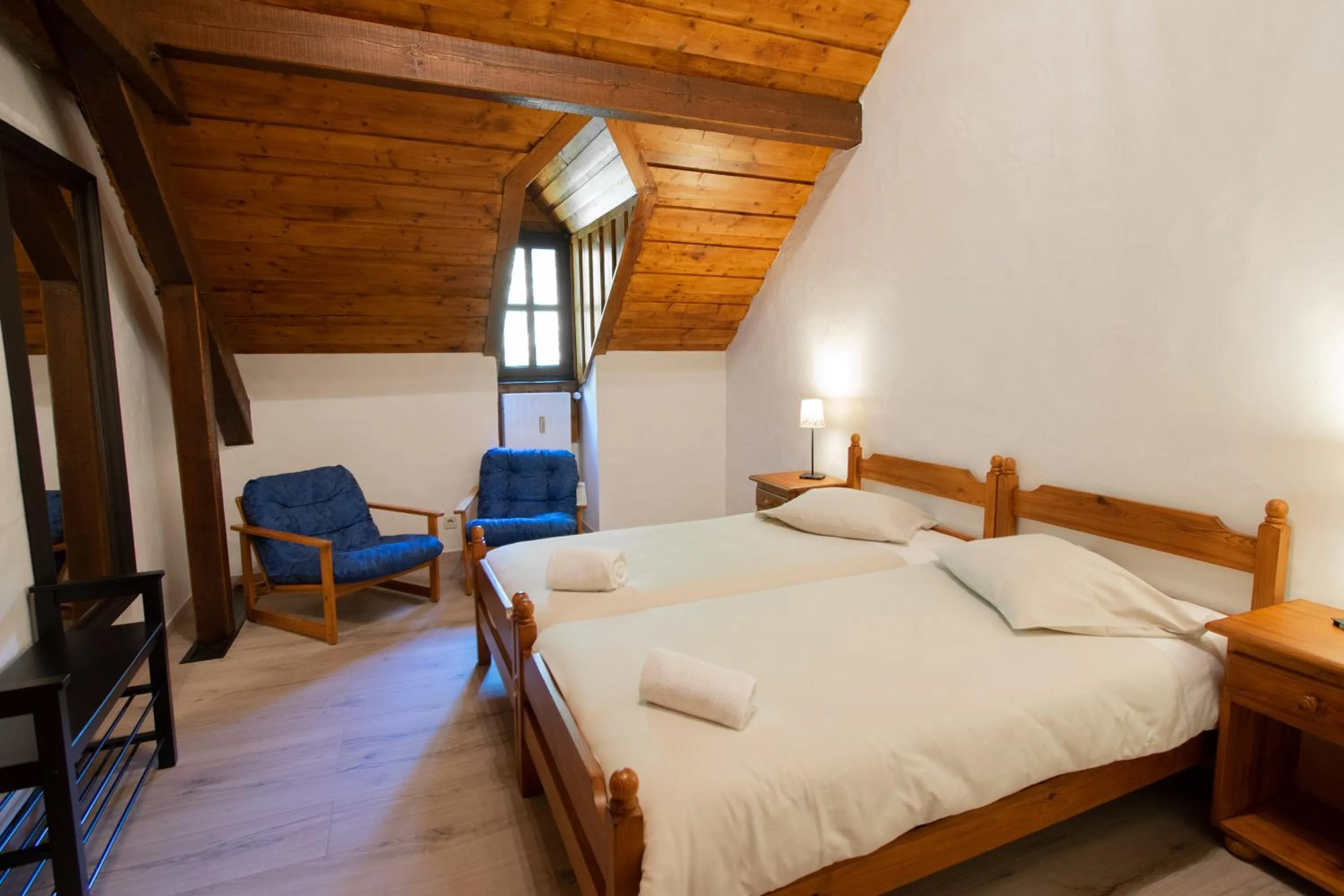 Photo of the whole room, Bed in Domaine du Moulin d'Asselborn