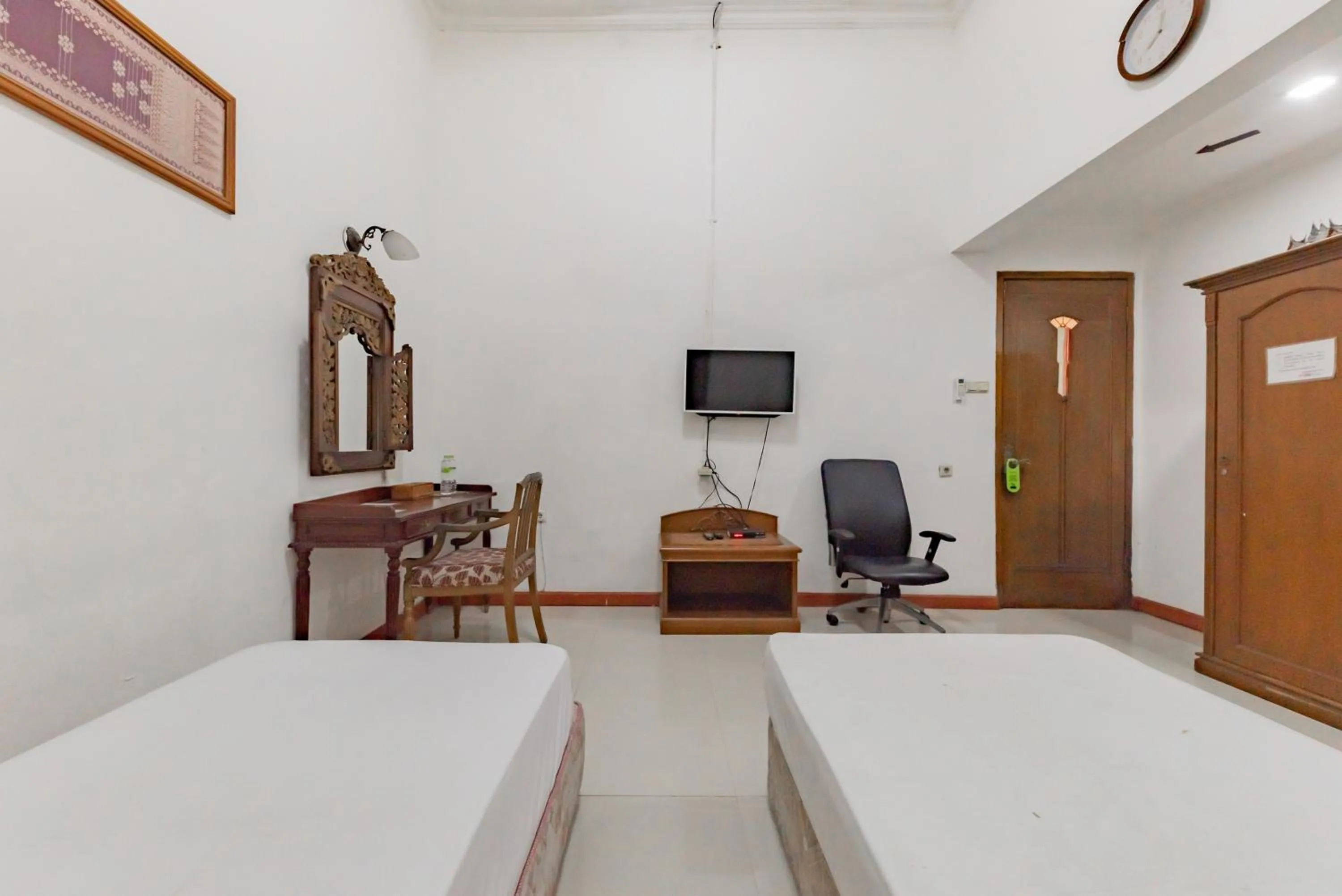 Bedroom in Urbanview De Ethnic Hotel Bandung by RedDoorz