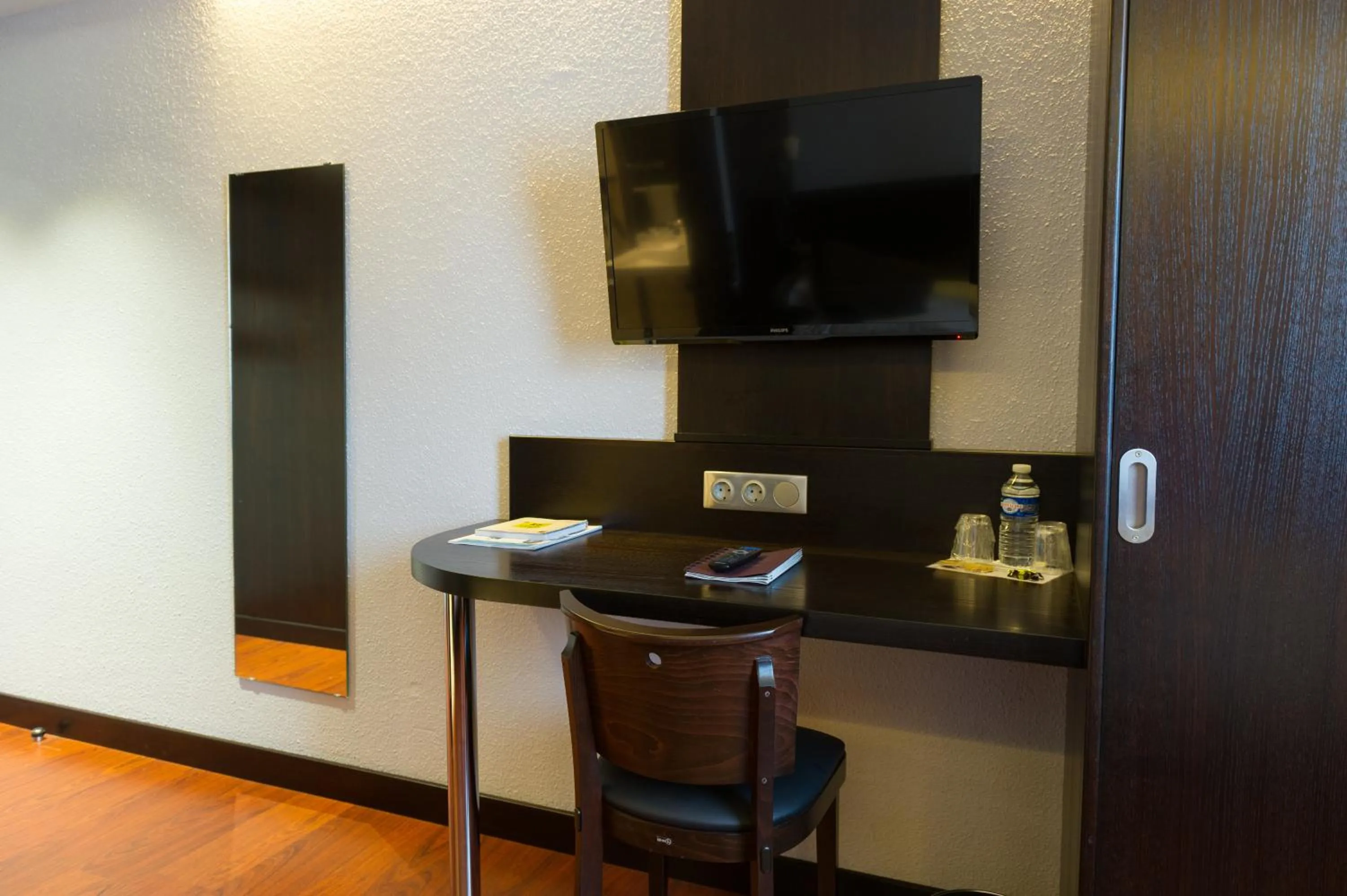 Seating area in Cottage Logis Hôtel - Restaurant