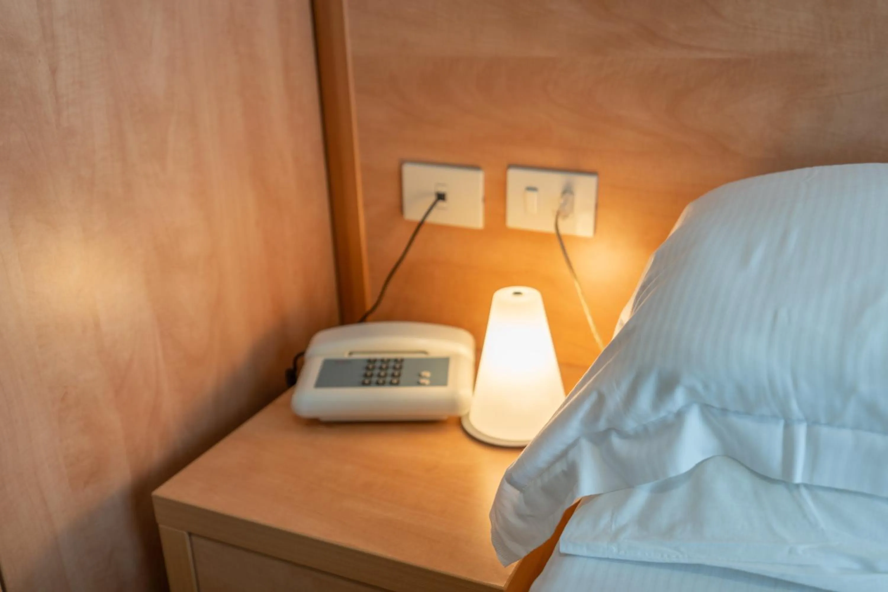 Bedroom in Hotel La Pineta