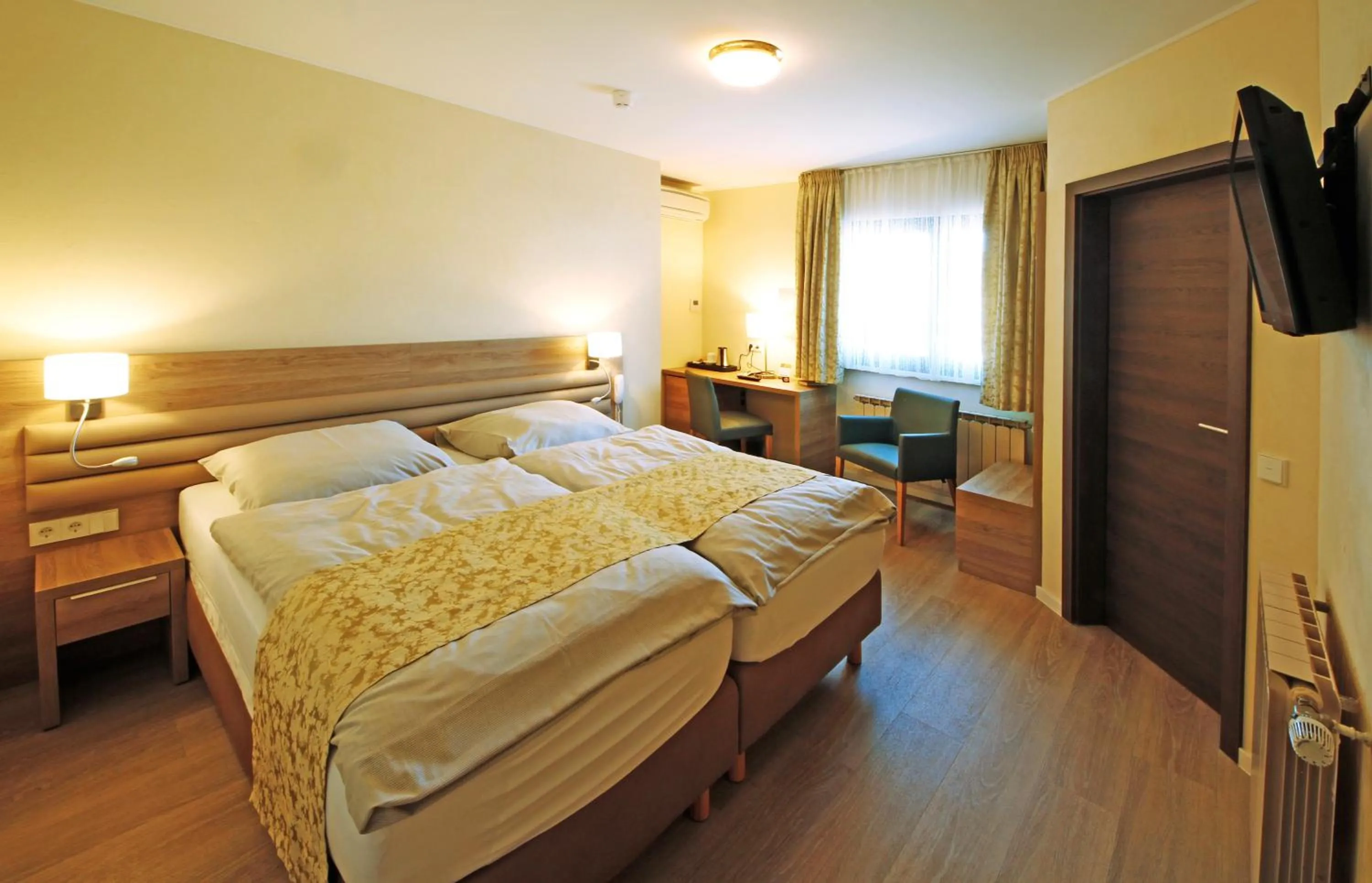 Bed in Hotel Saint Fiacre