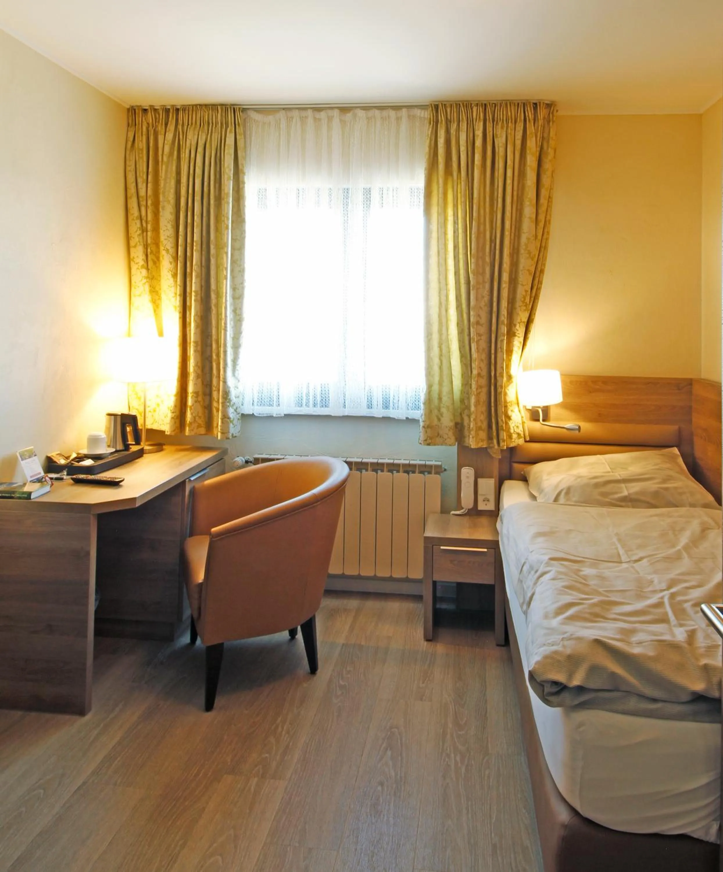 Bed in Hotel Saint Fiacre