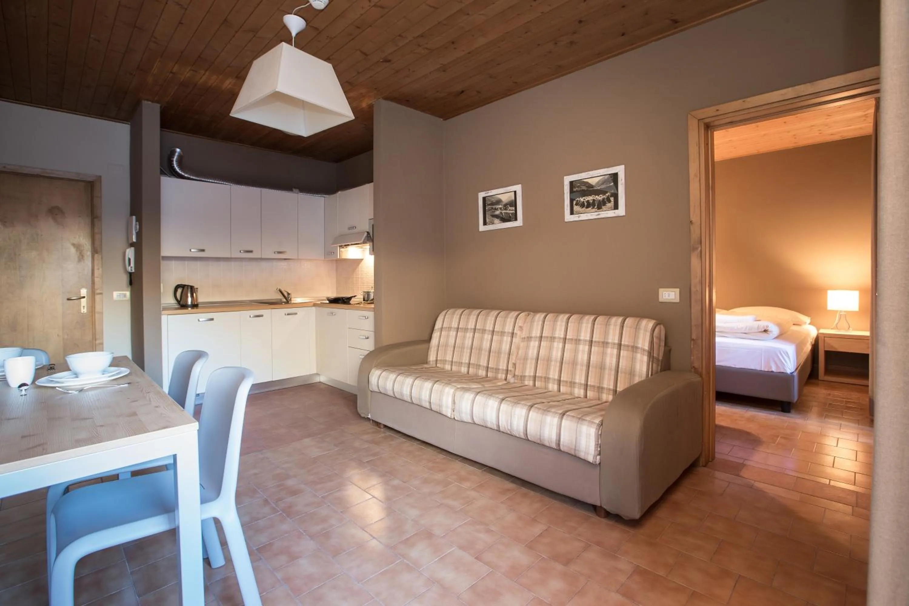 Kitchen or kitchenette, Bed in La Villa Feleit