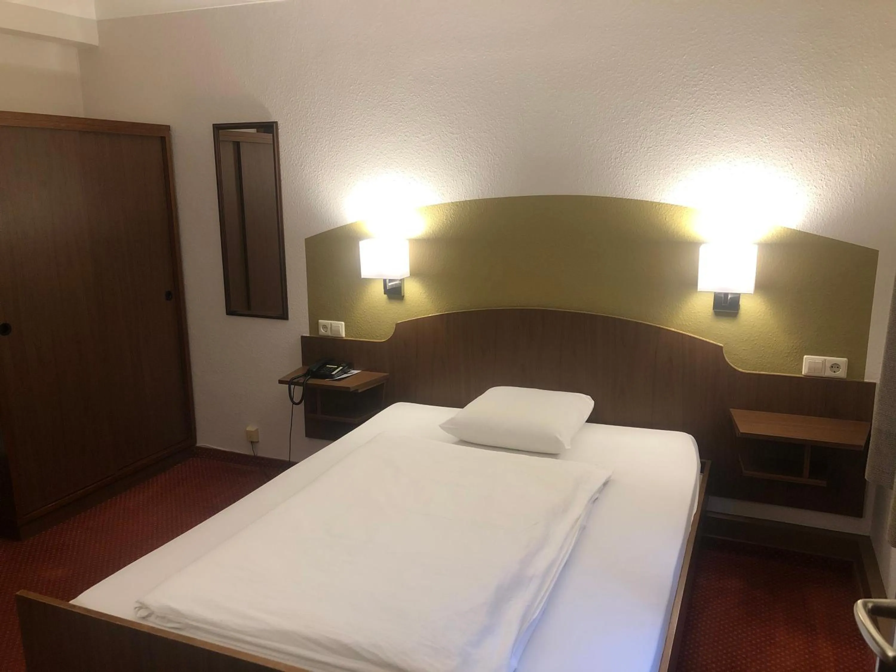 Bed in Hotel du Parc