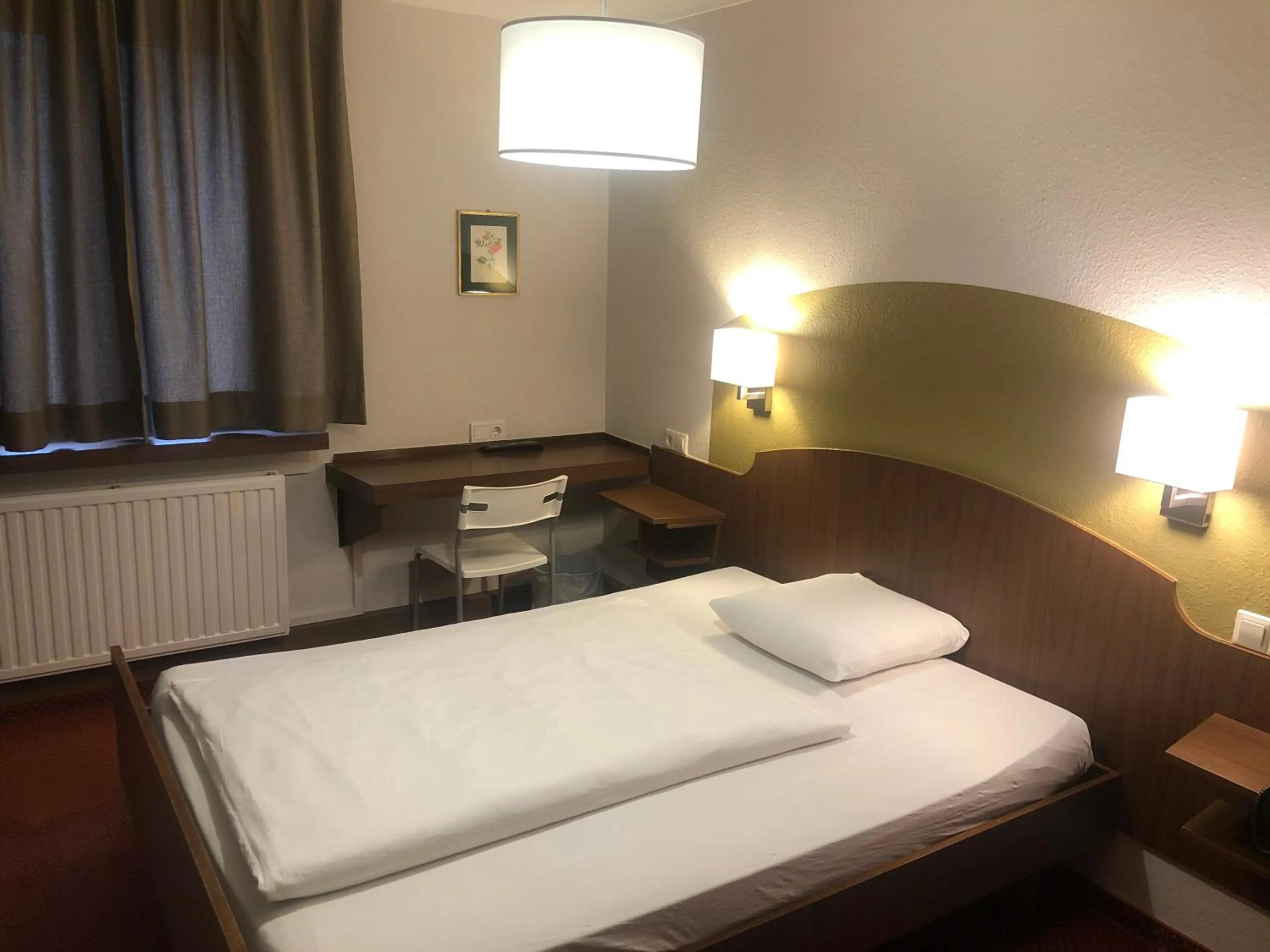 Bed in Hotel du Parc