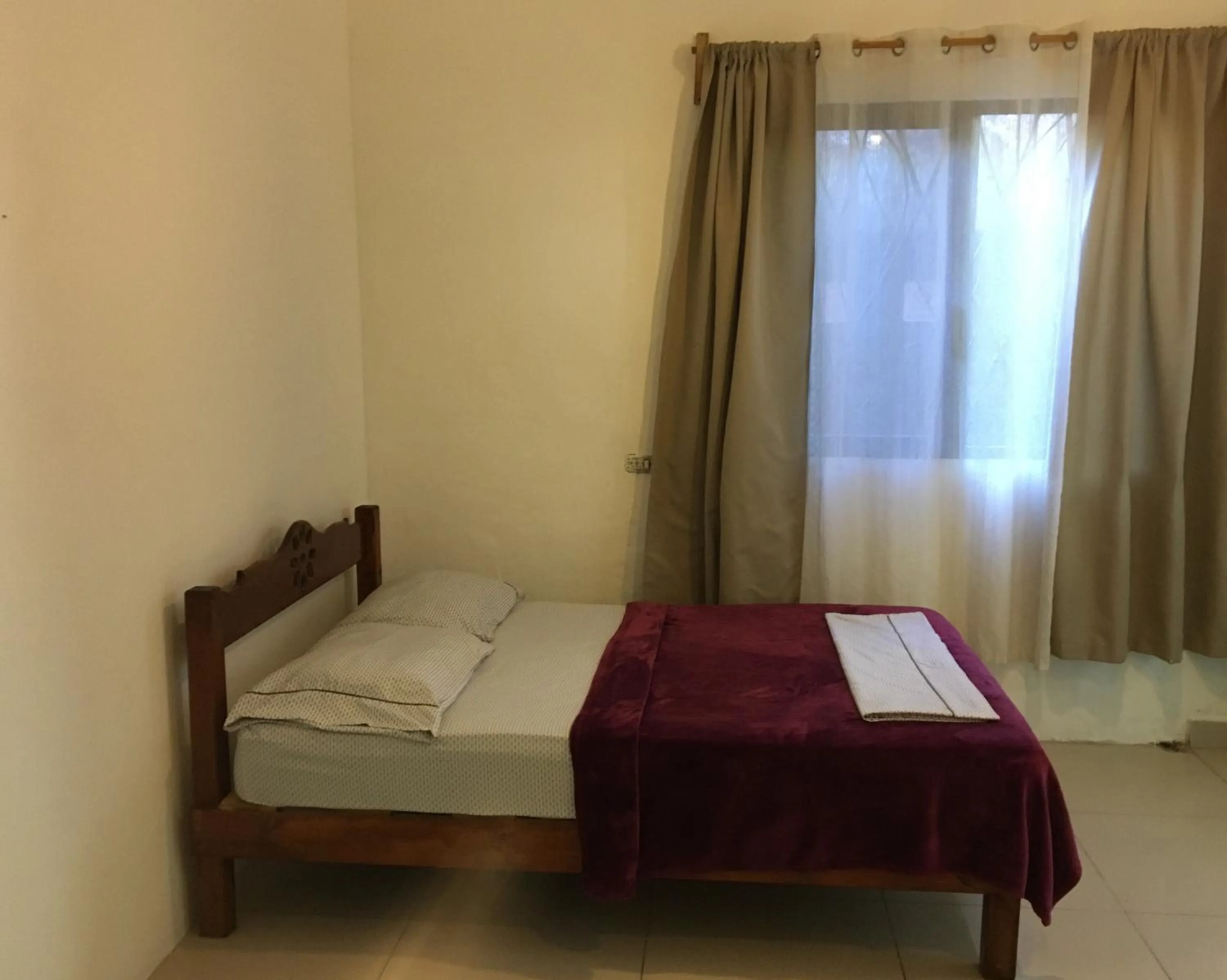 Bed in Hostal Cha Cha Cha