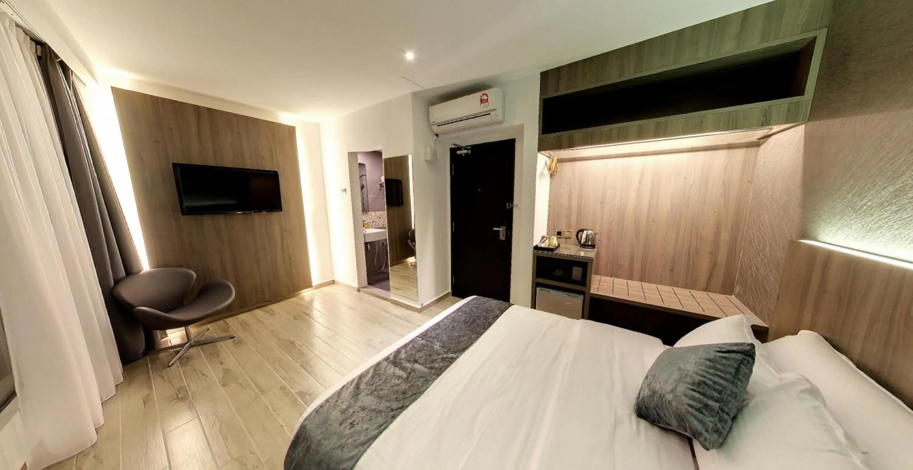 Bedroom in Flora by Crossroads Hotel