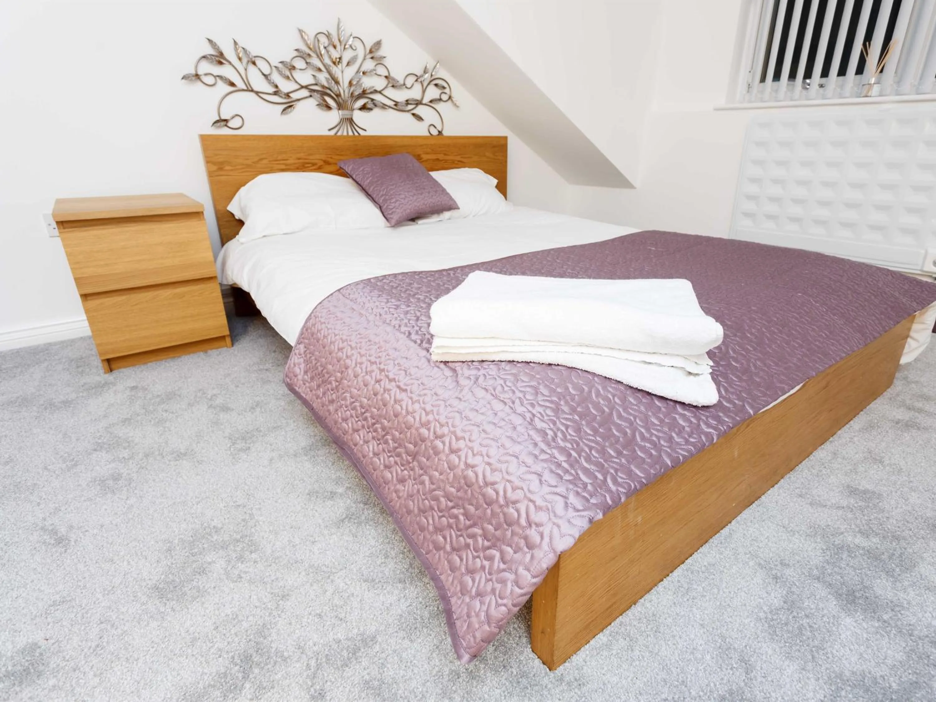 Bedroom in Ruth Apartments