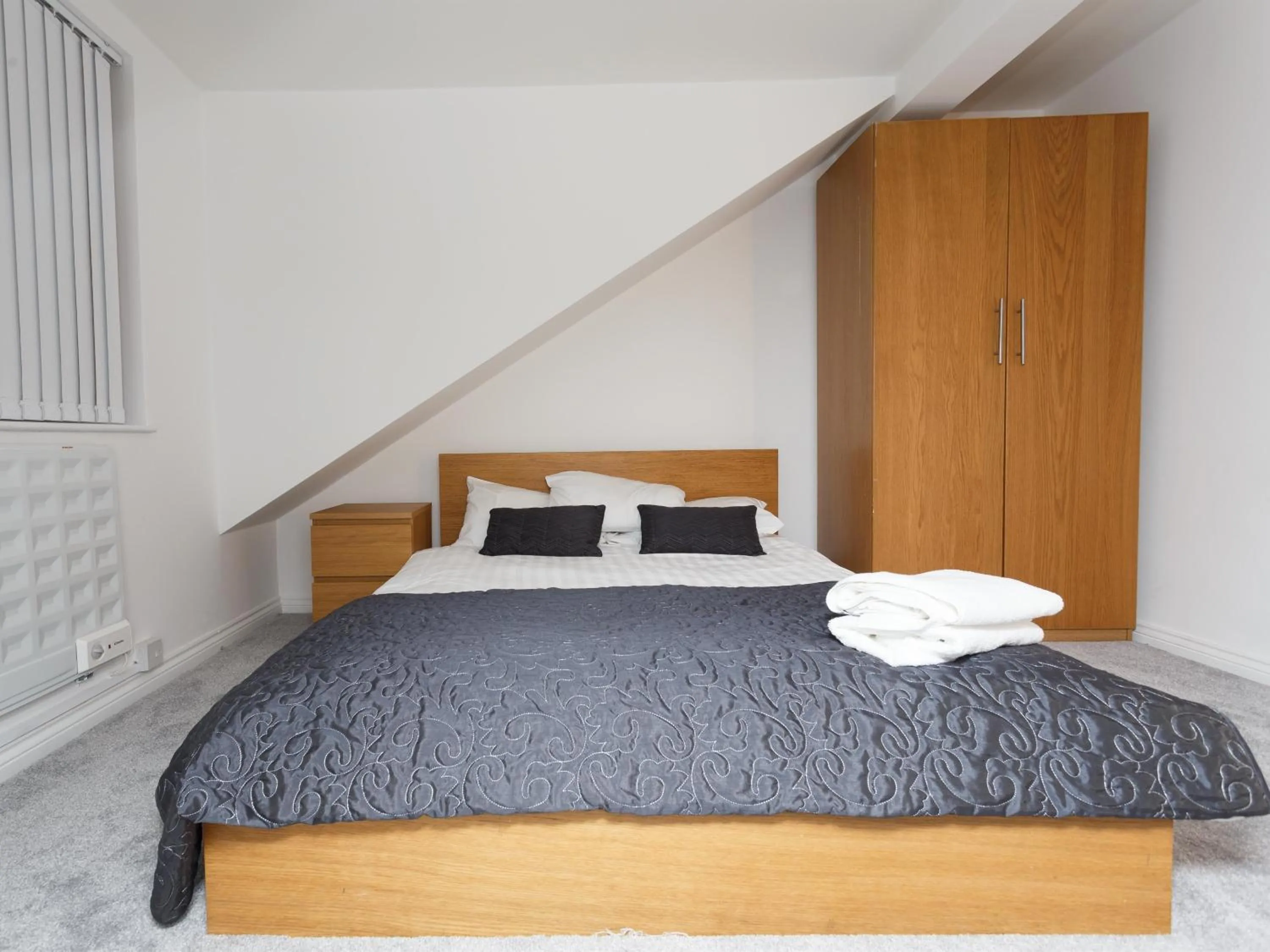 Bedroom in Ruth Apartments