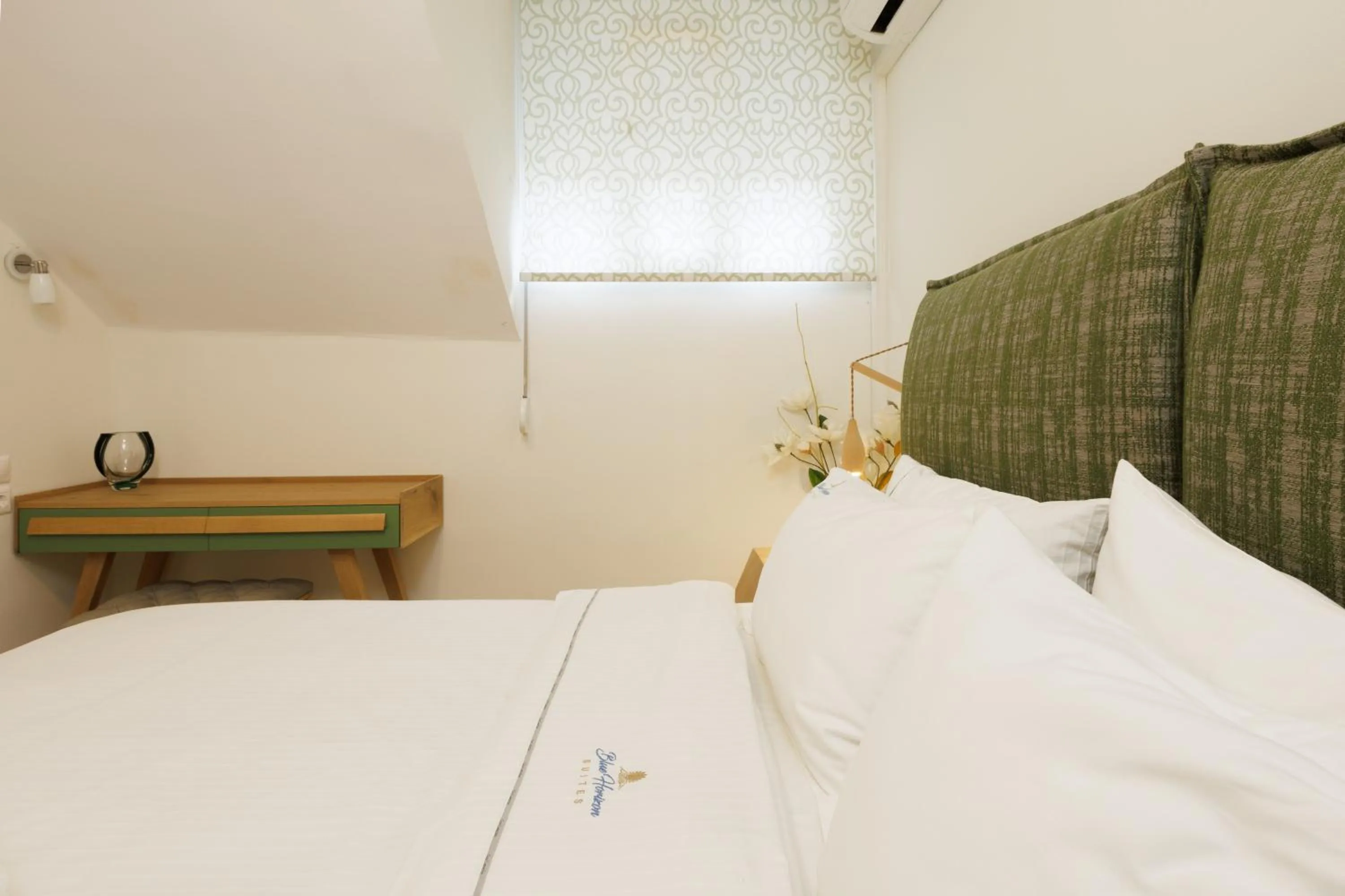 Bed in Blue Horizon Suites