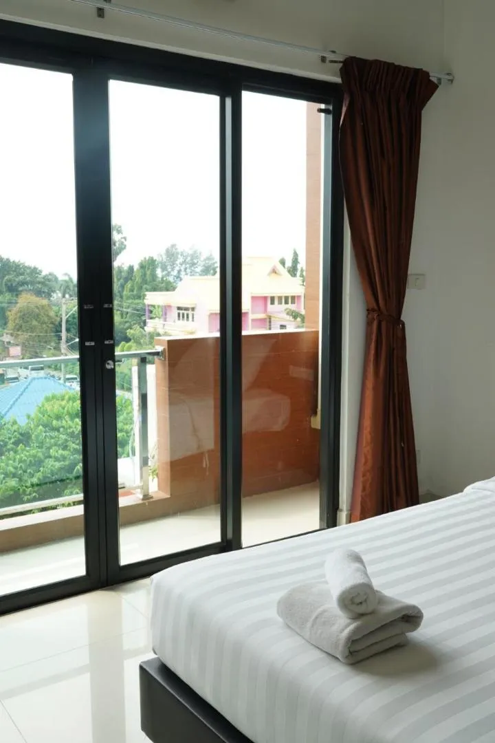 View (from property/room), Bed in Tribe Pattaya