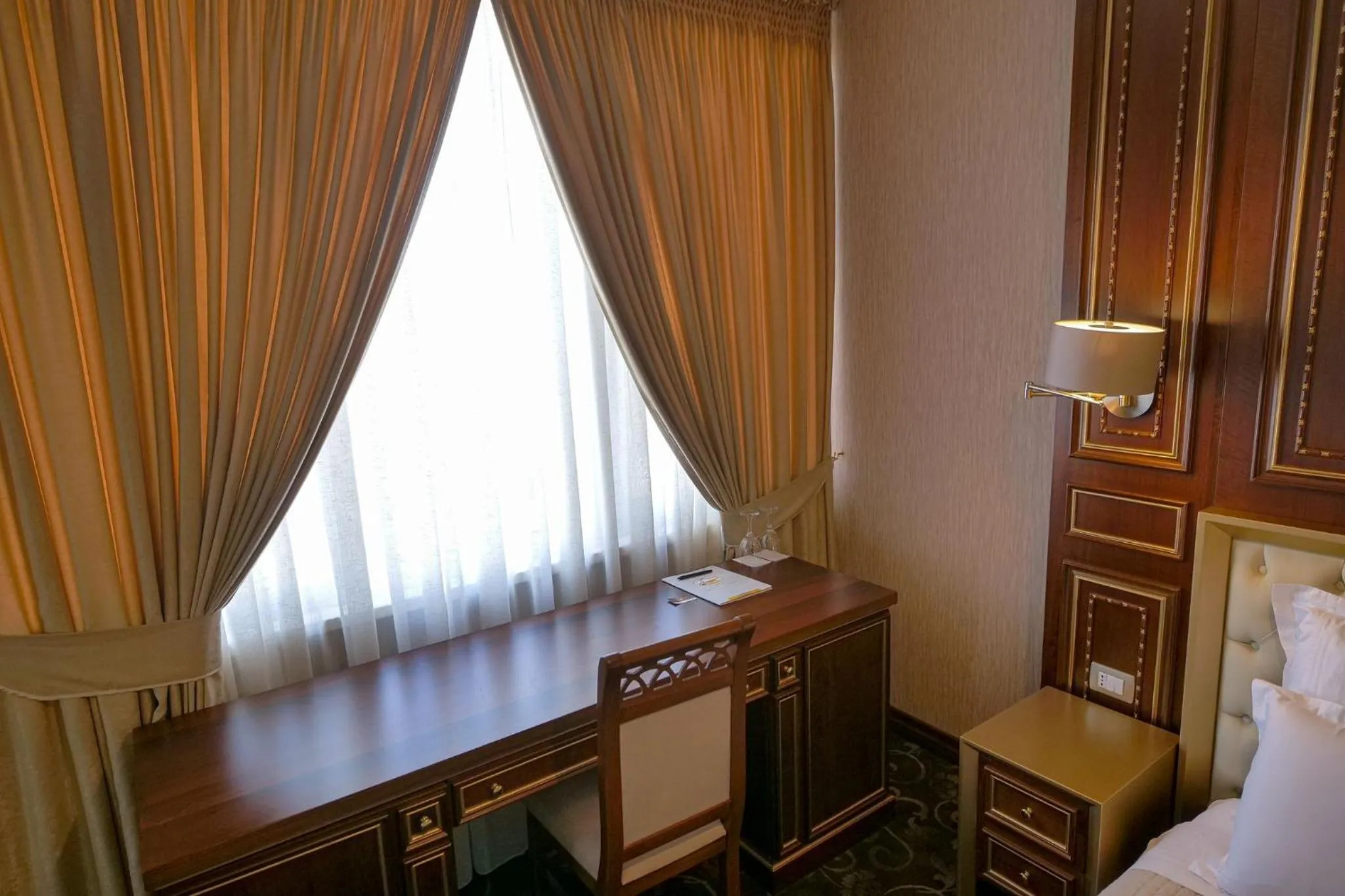 Seating area, Bed in Rozafa Hotel