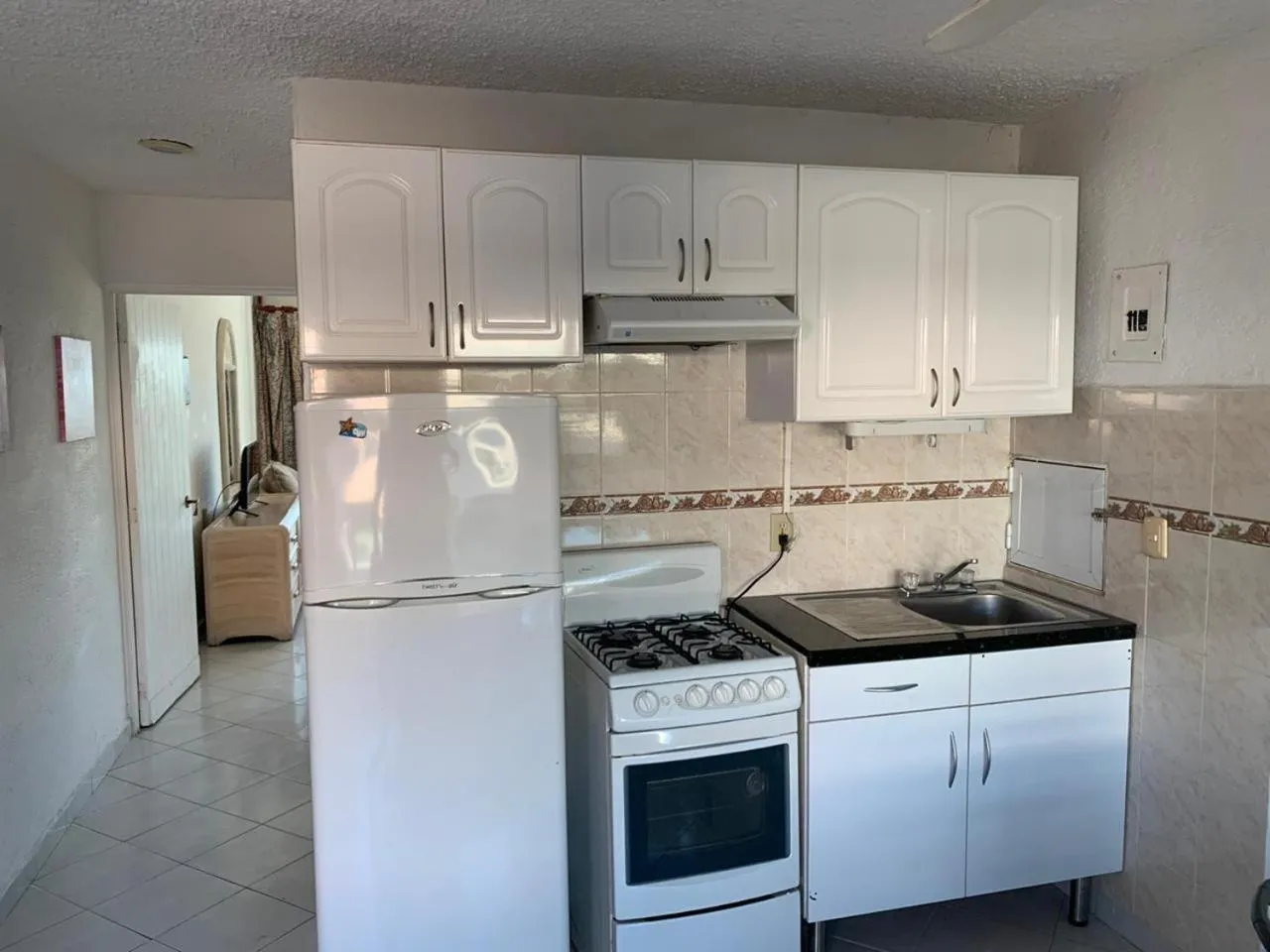 Kitchen or kitchenette in Suites Brisas Cancun