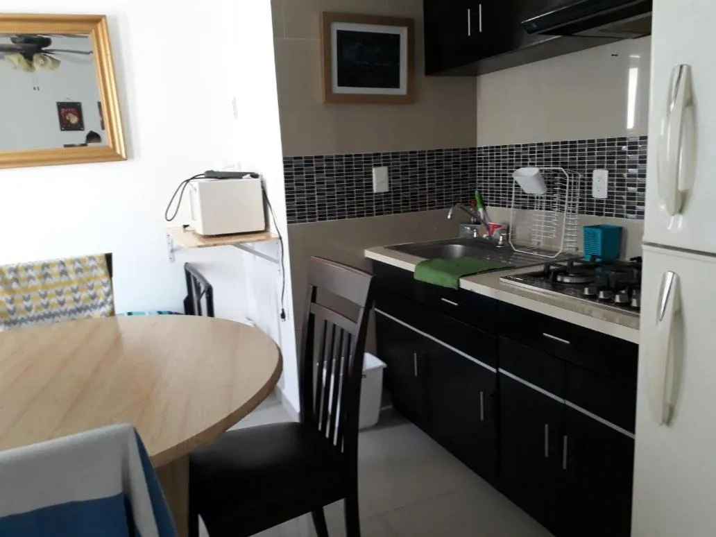 Kitchen or kitchenette in Suites Brisas Cancun