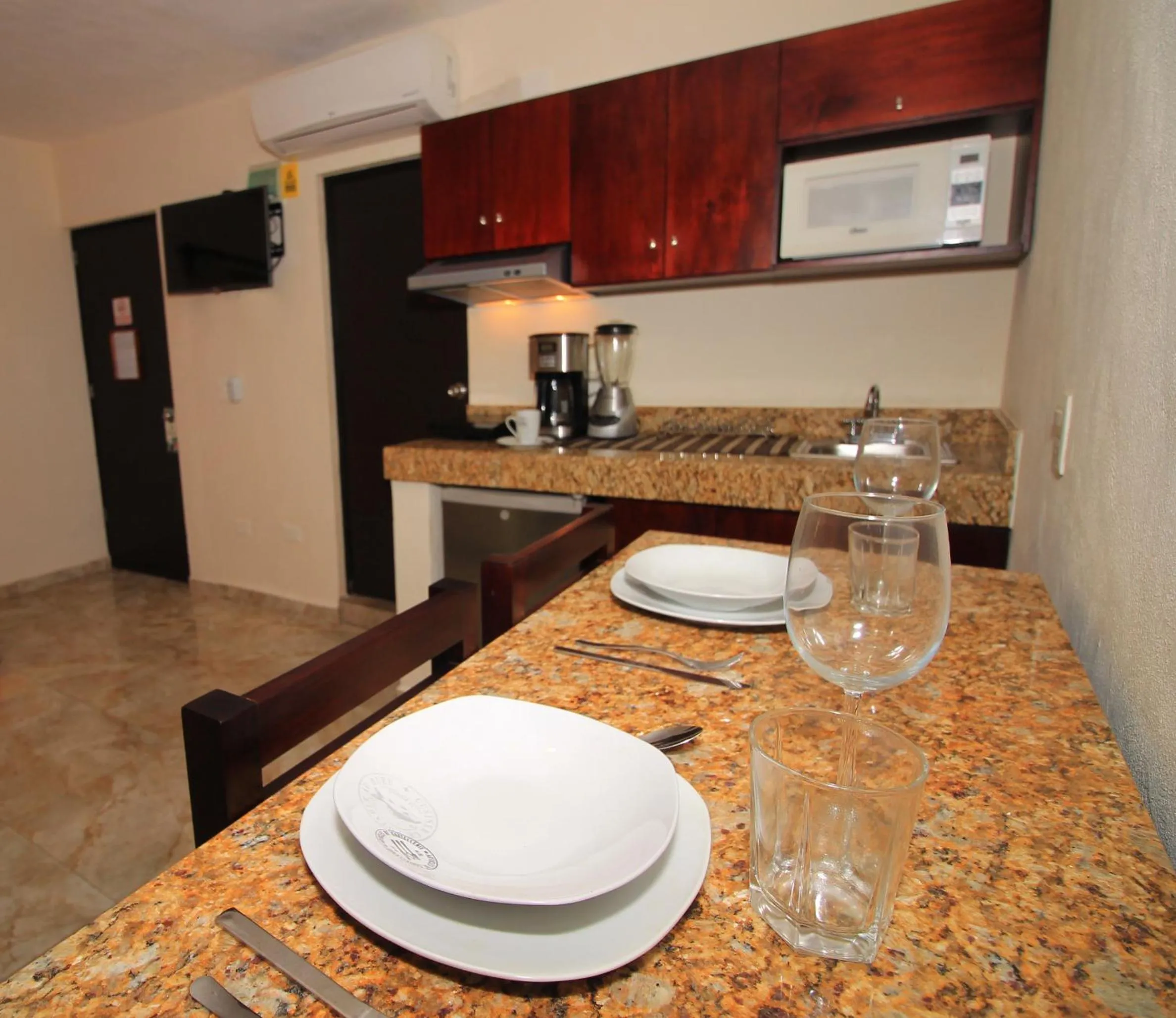 Kitchen or kitchenette in Papagayo Hotel Boutique