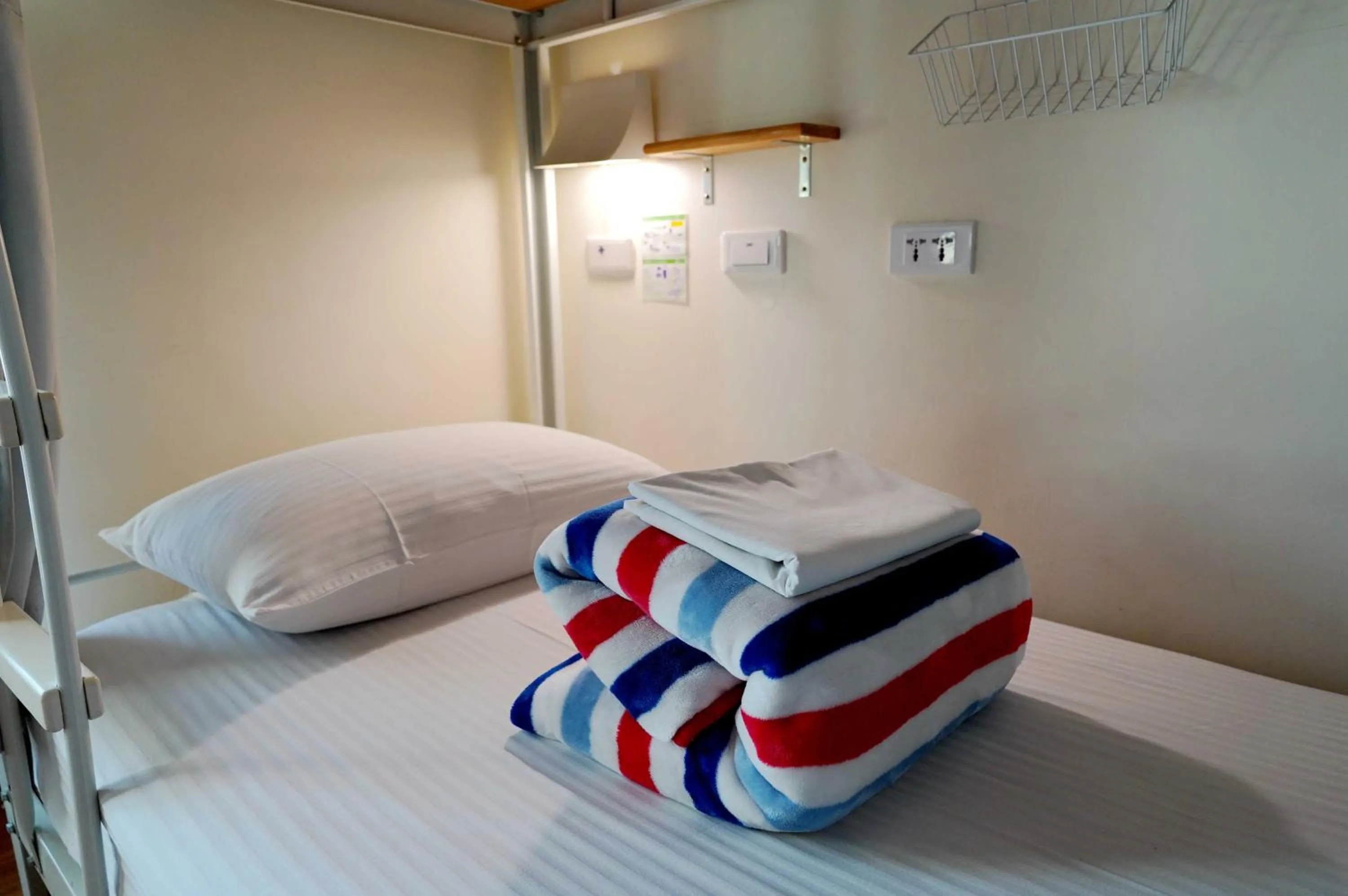 Bed in 安蘭居旅店 An Lan Jie Hotel