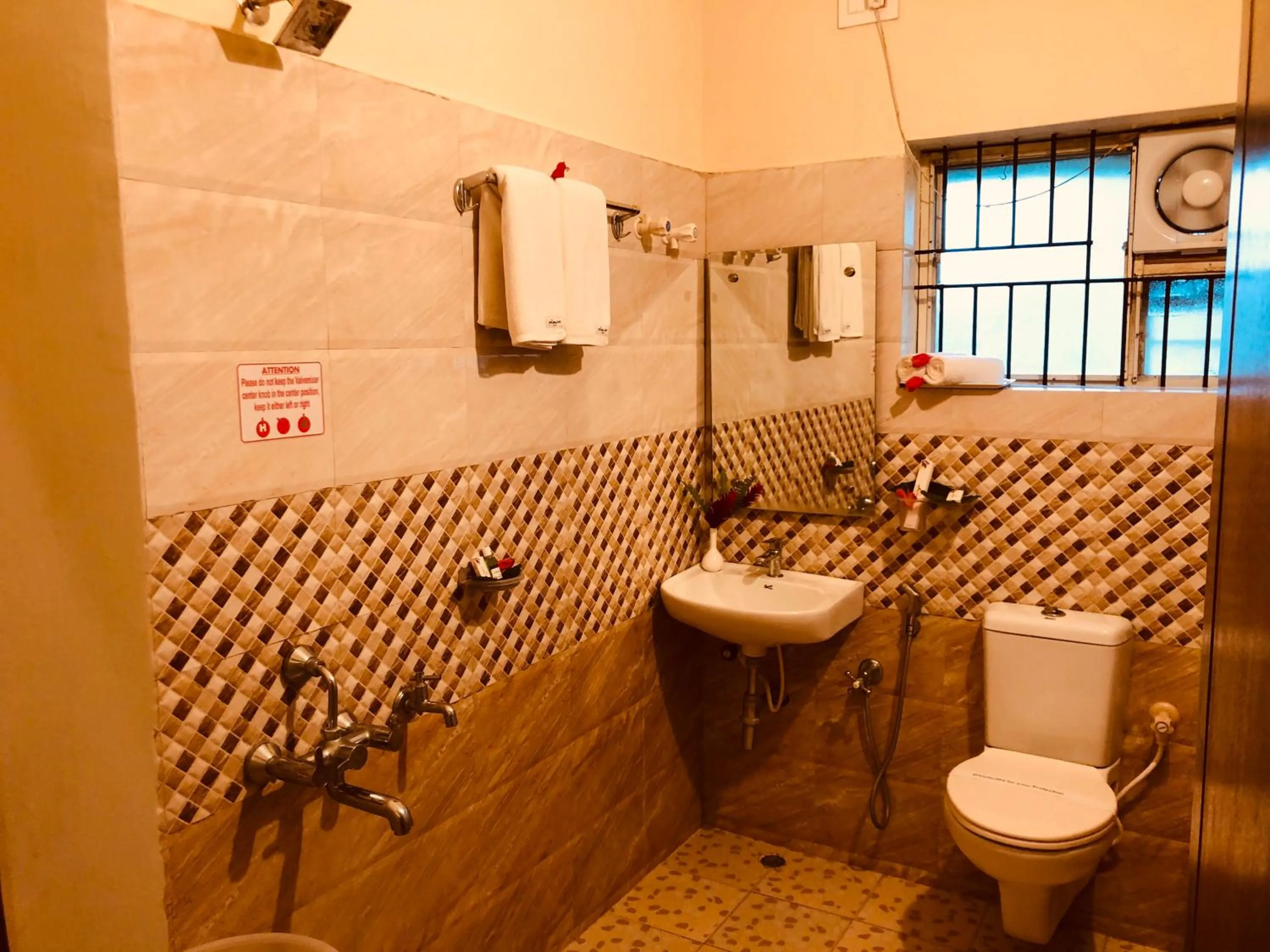 Toilet in Palm Era Resorts