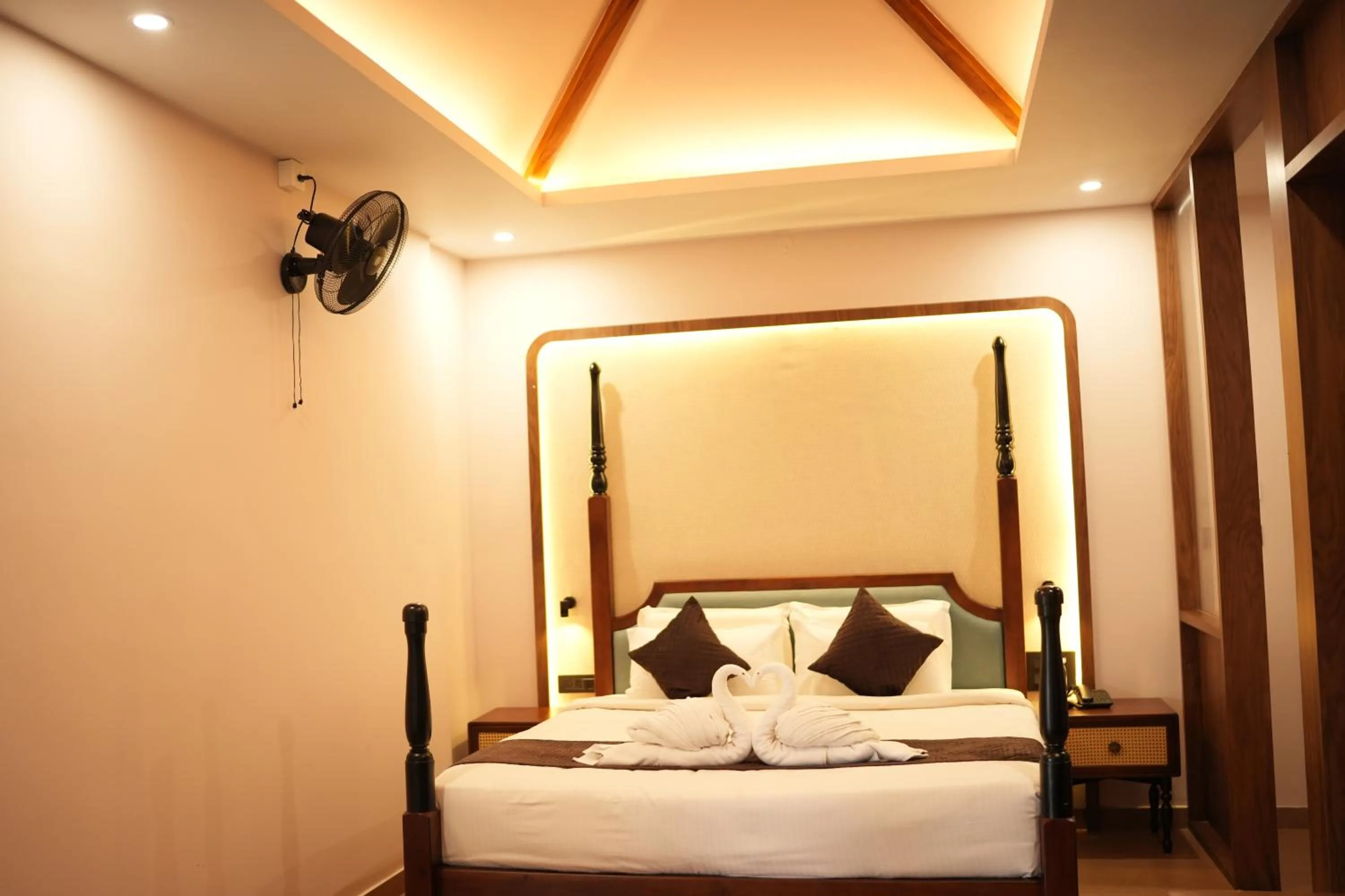 Bed in Palm Era Resorts