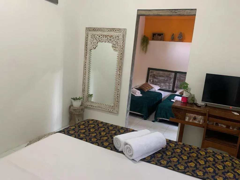 Bed in Nextdoor Rooms