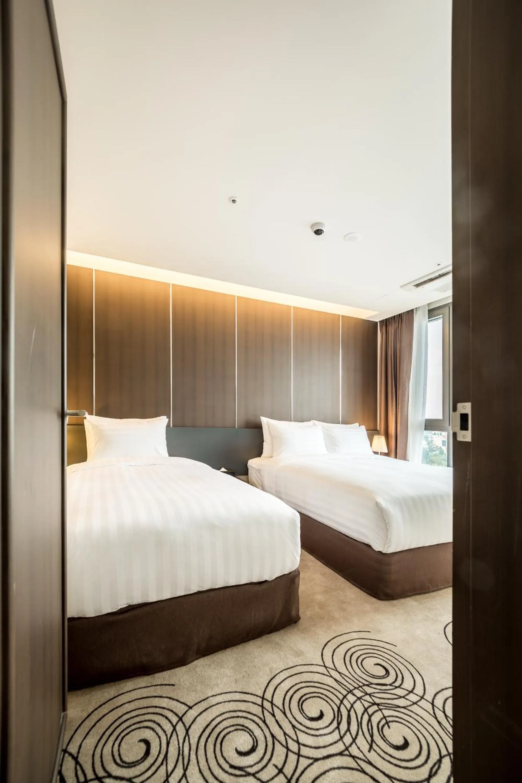 Bed in Golden Daisy Hotel