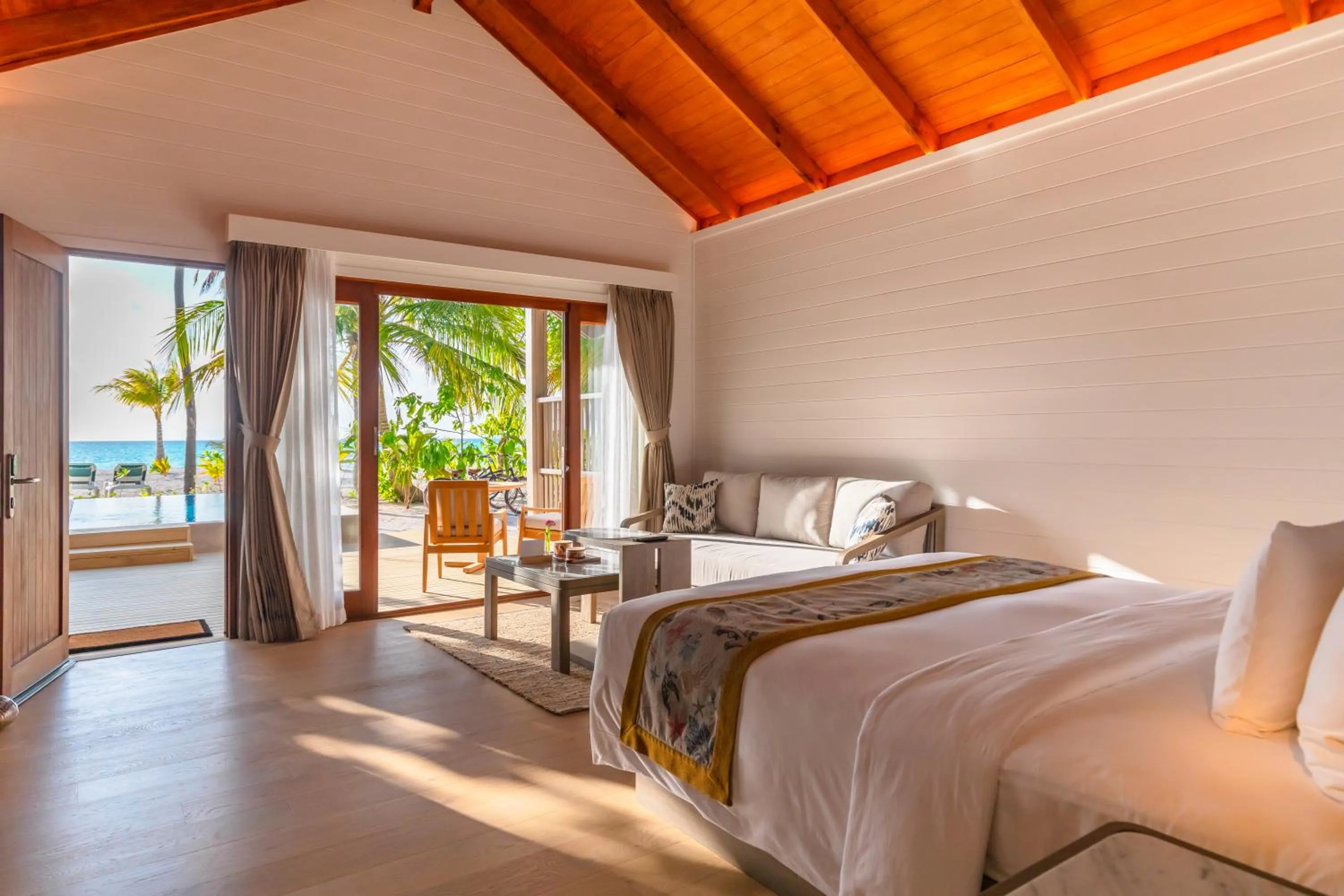 Bed in Meeru Maldives Resort Island