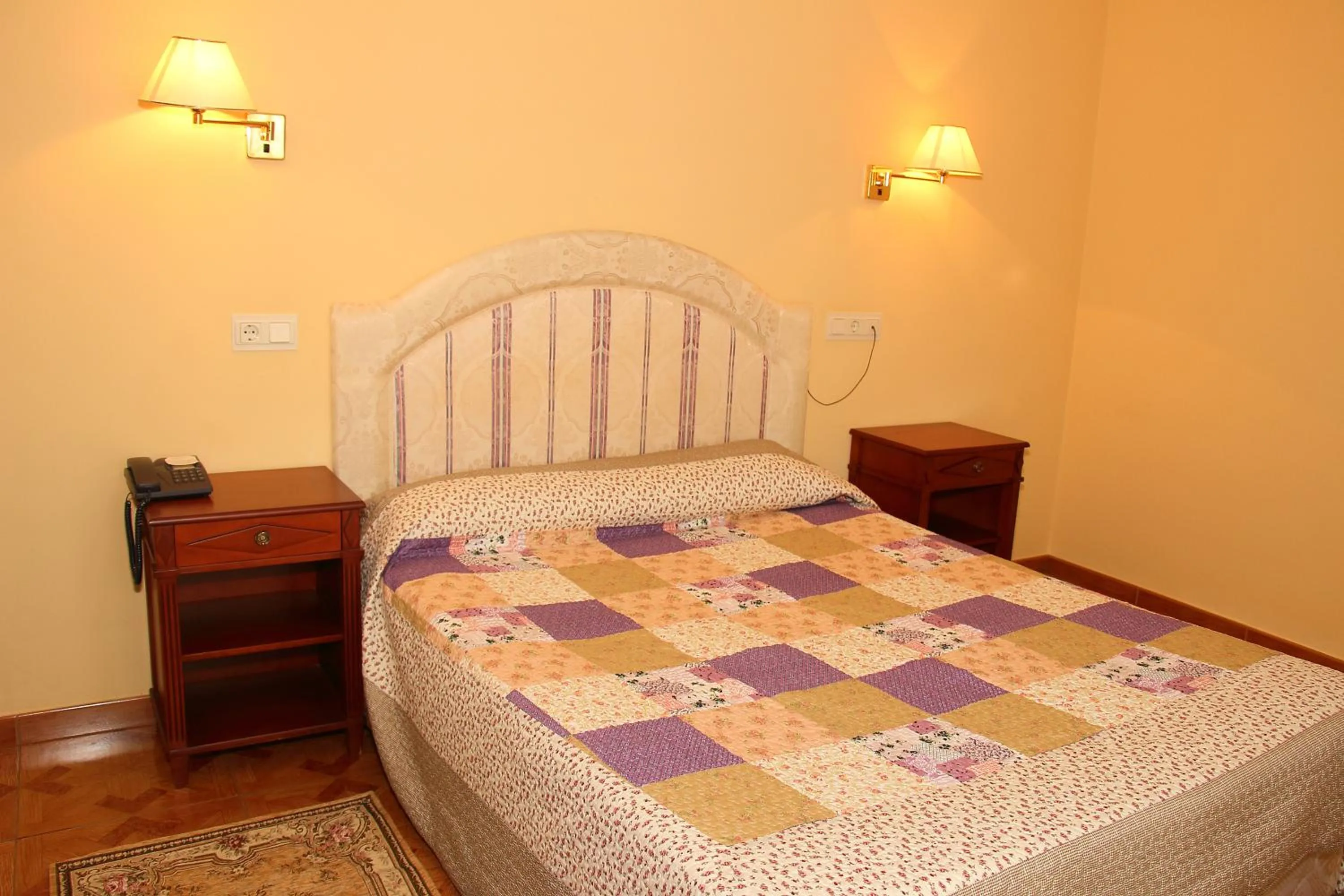 Property building, Bed in Hotel Avenida III