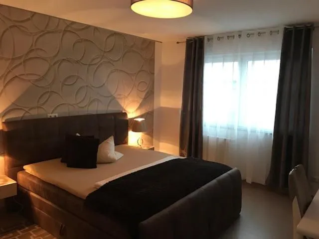 Photo of the whole room, Bed in Aparthotel Magnolia