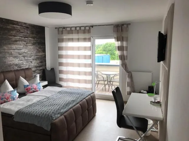 Photo of the whole room, Bed in Aparthotel Magnolia