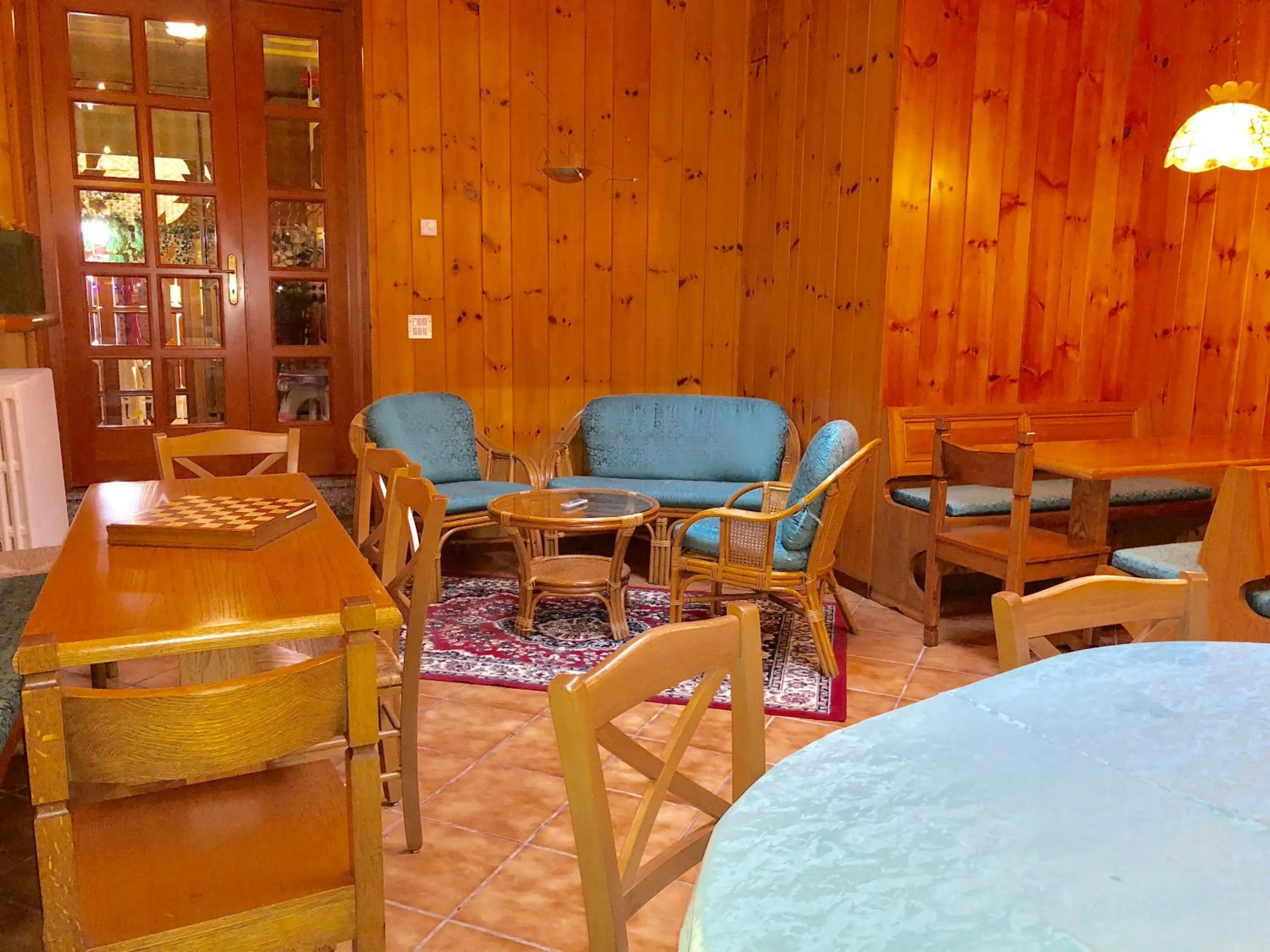 Communal lounge/ TV room in Hotel Americana