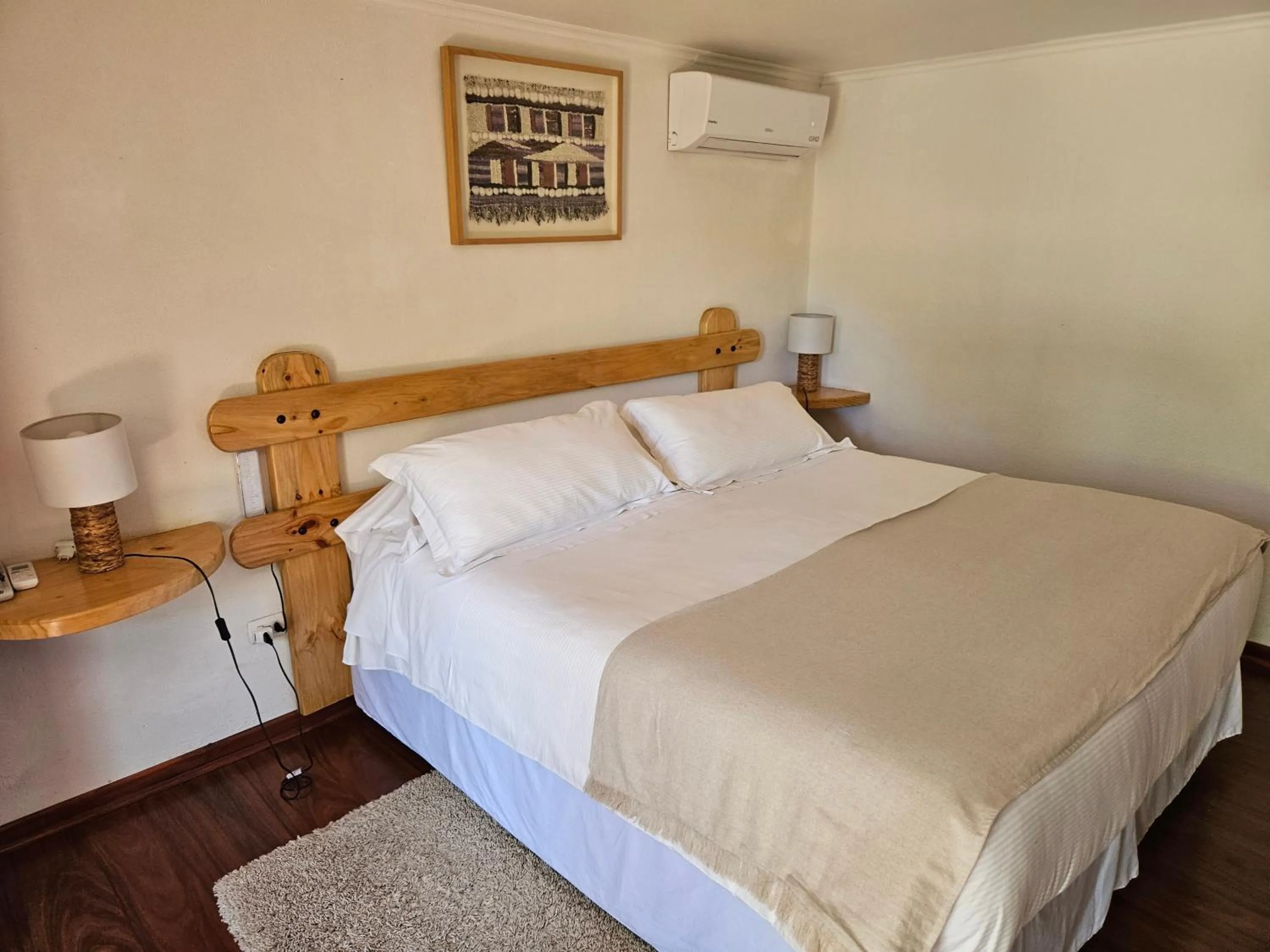 Photo of the whole room, Bed in Casa Calfu