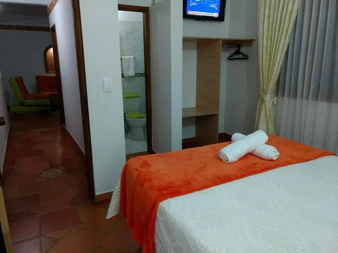 Bed in Apartahotel La Gran Familia