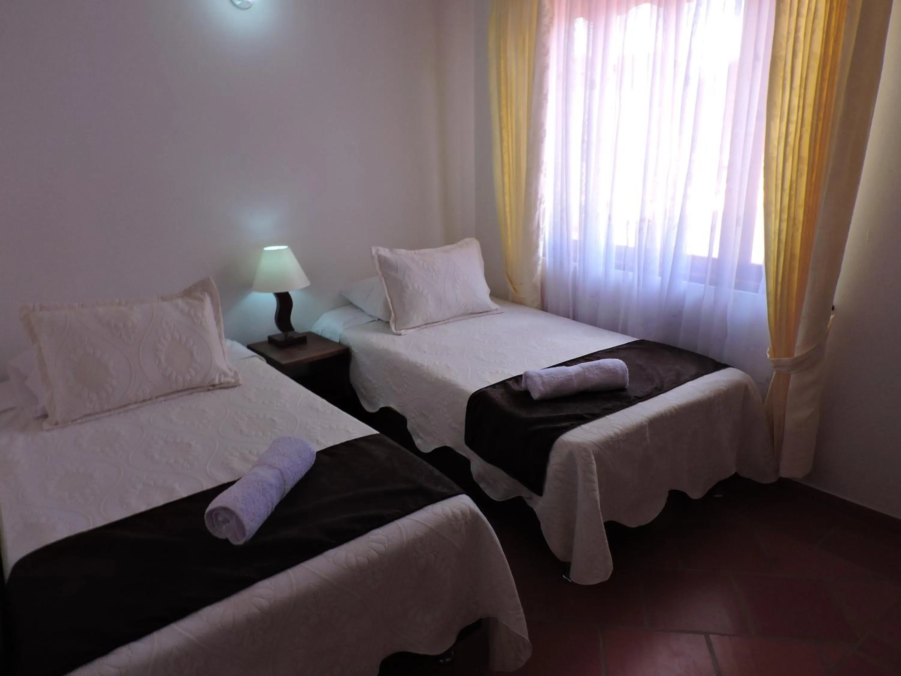 Bed in Apartahotel La Gran Familia