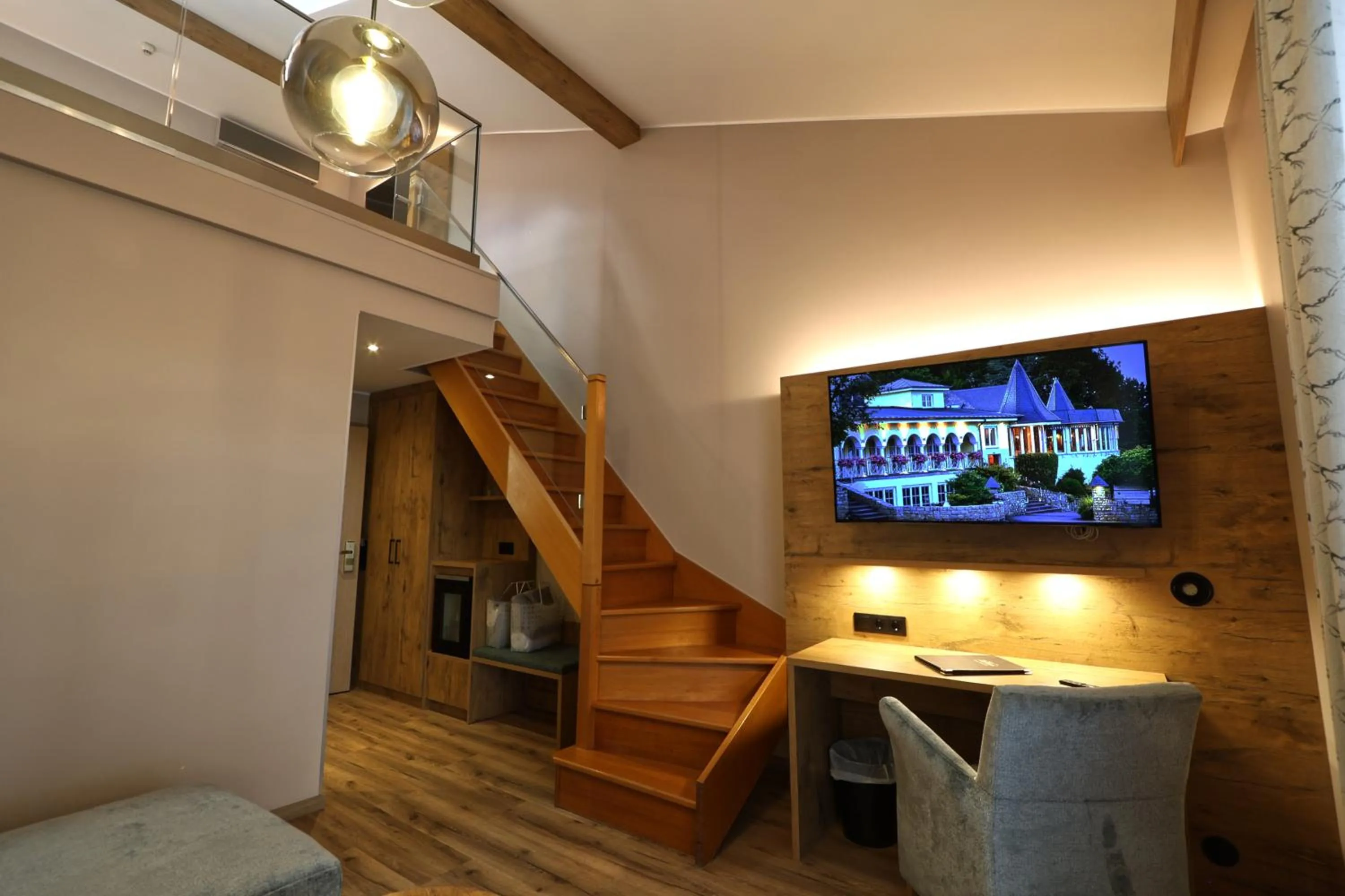 Communal lounge/ TV room in Domaine de la Forêt