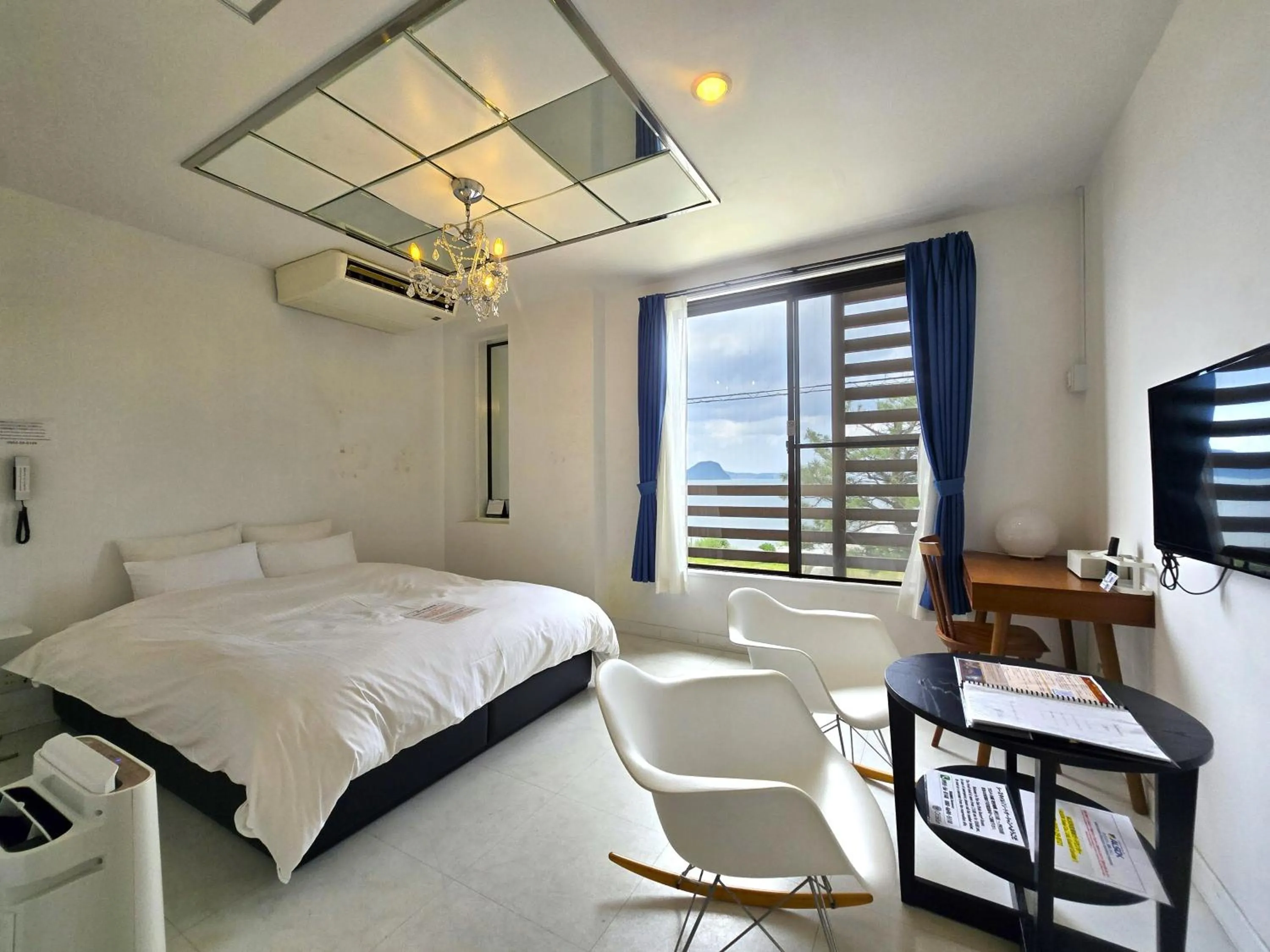 Photo of the whole room, Bed in Sea Style Resort OCEAN