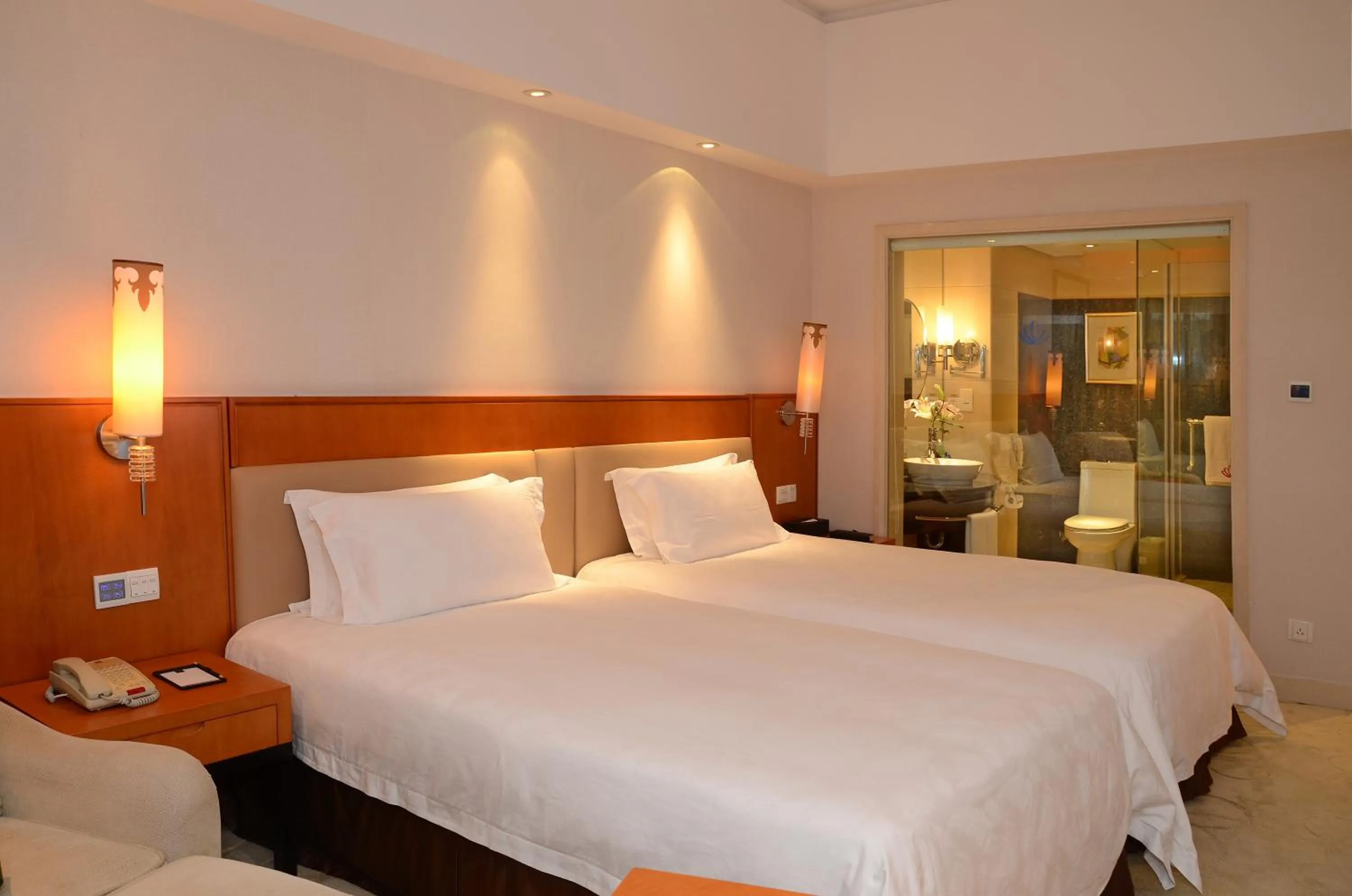 Bed in Dongguan Well Garden Hotel