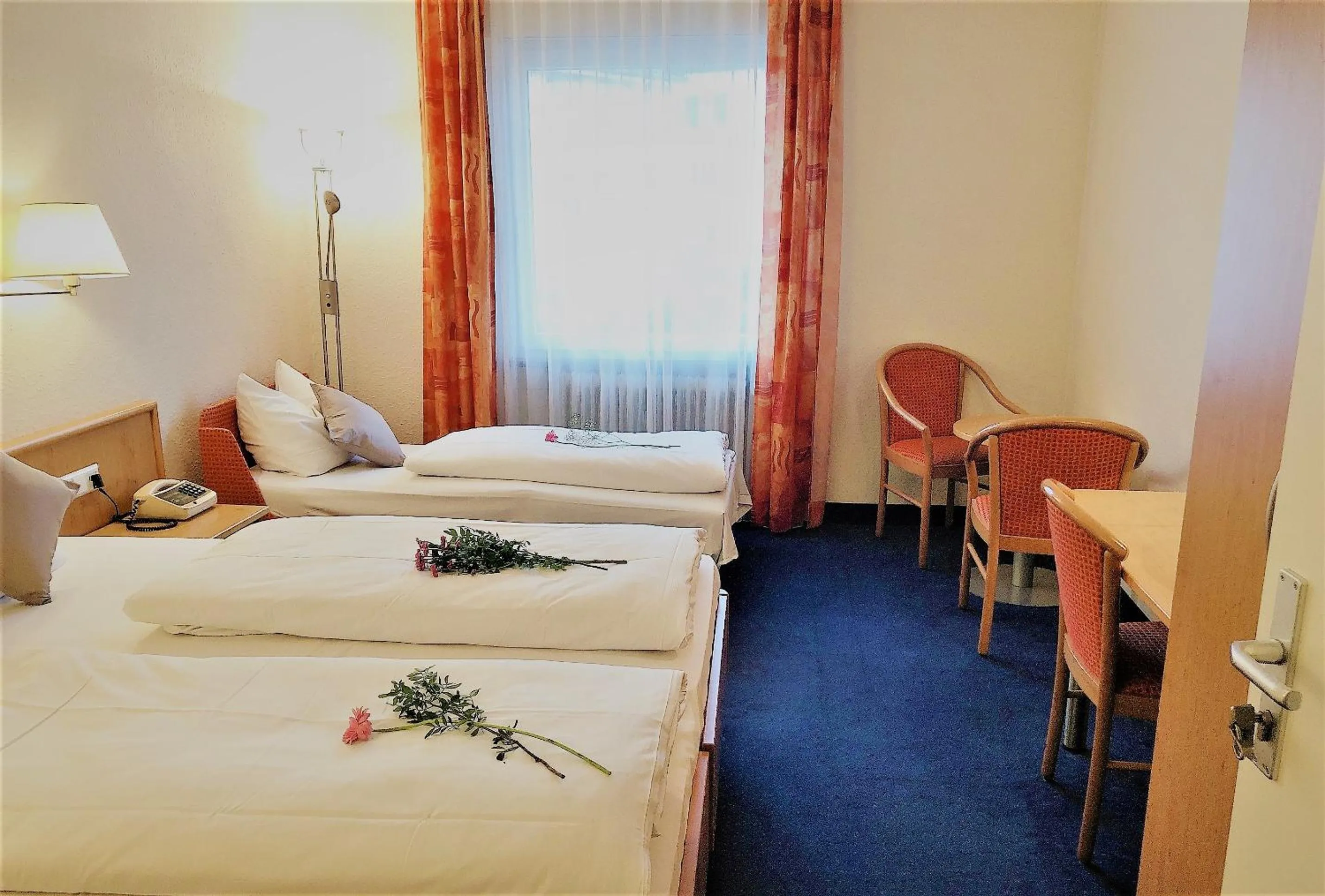 Photo of the whole room, Bed in Hotel Austria Stuttgart-City