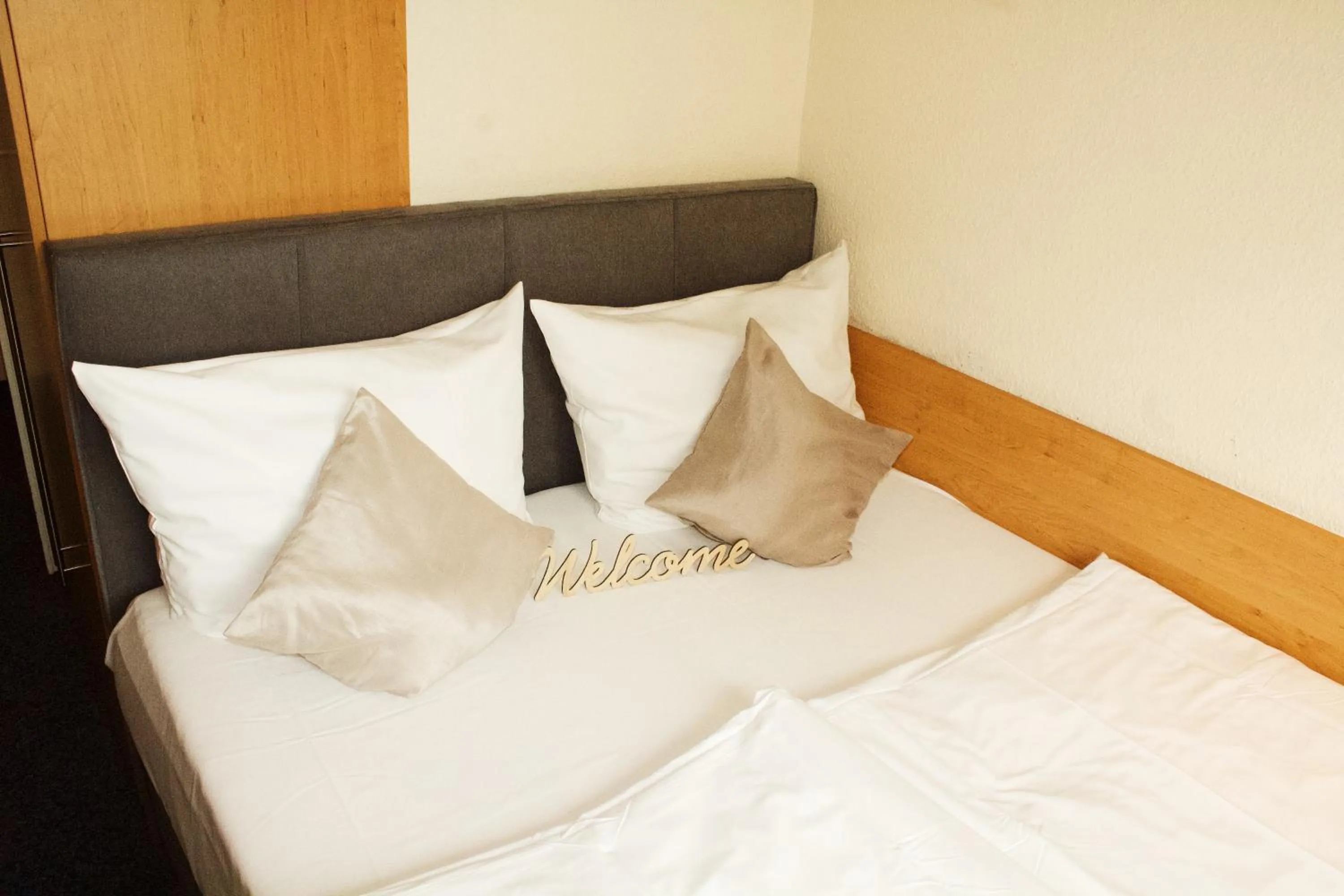 Photo of the whole room, Bed in Hotel Austria Stuttgart-City