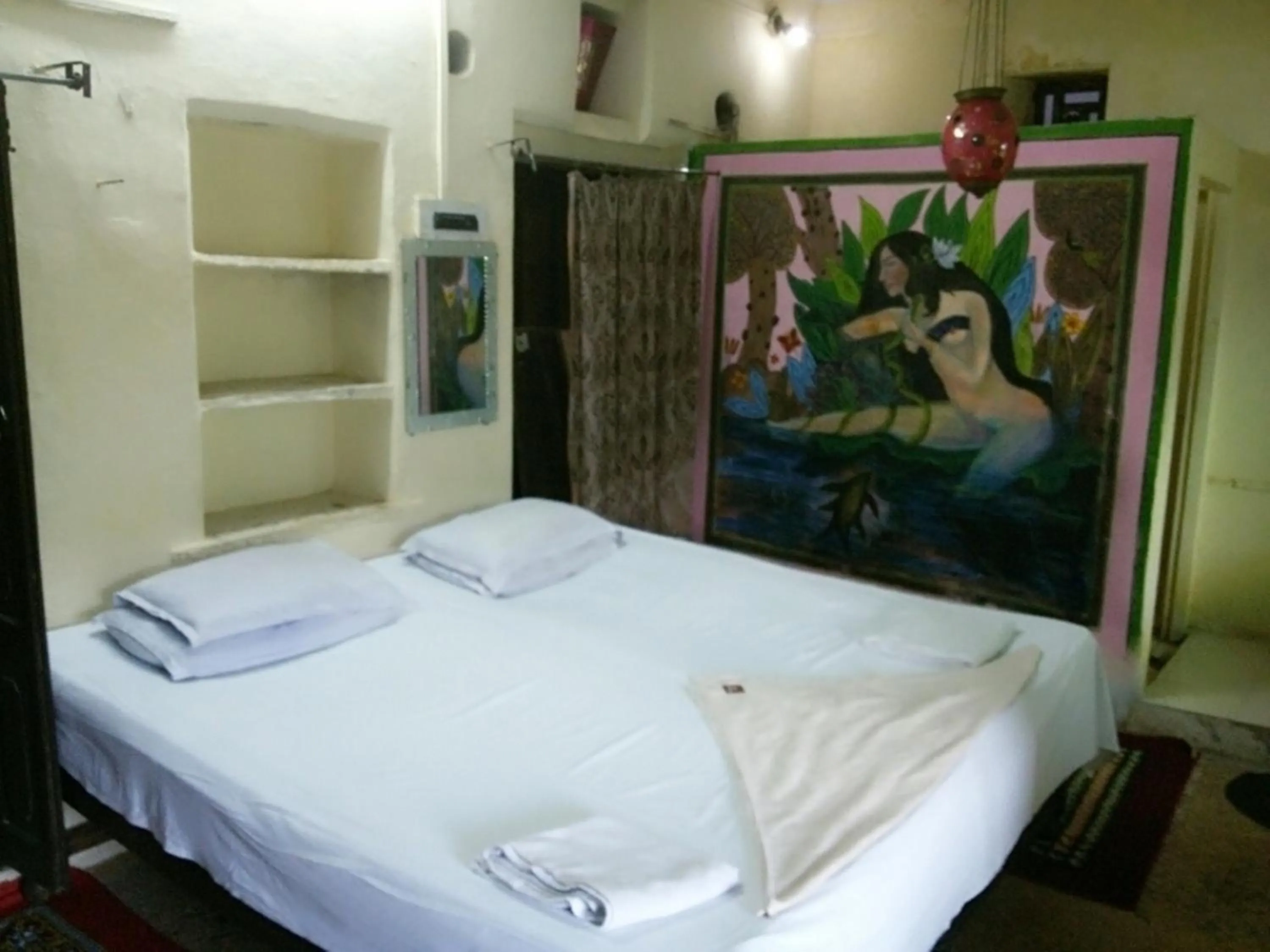 Bed in Haveli Uma Megh Tourist Guest House