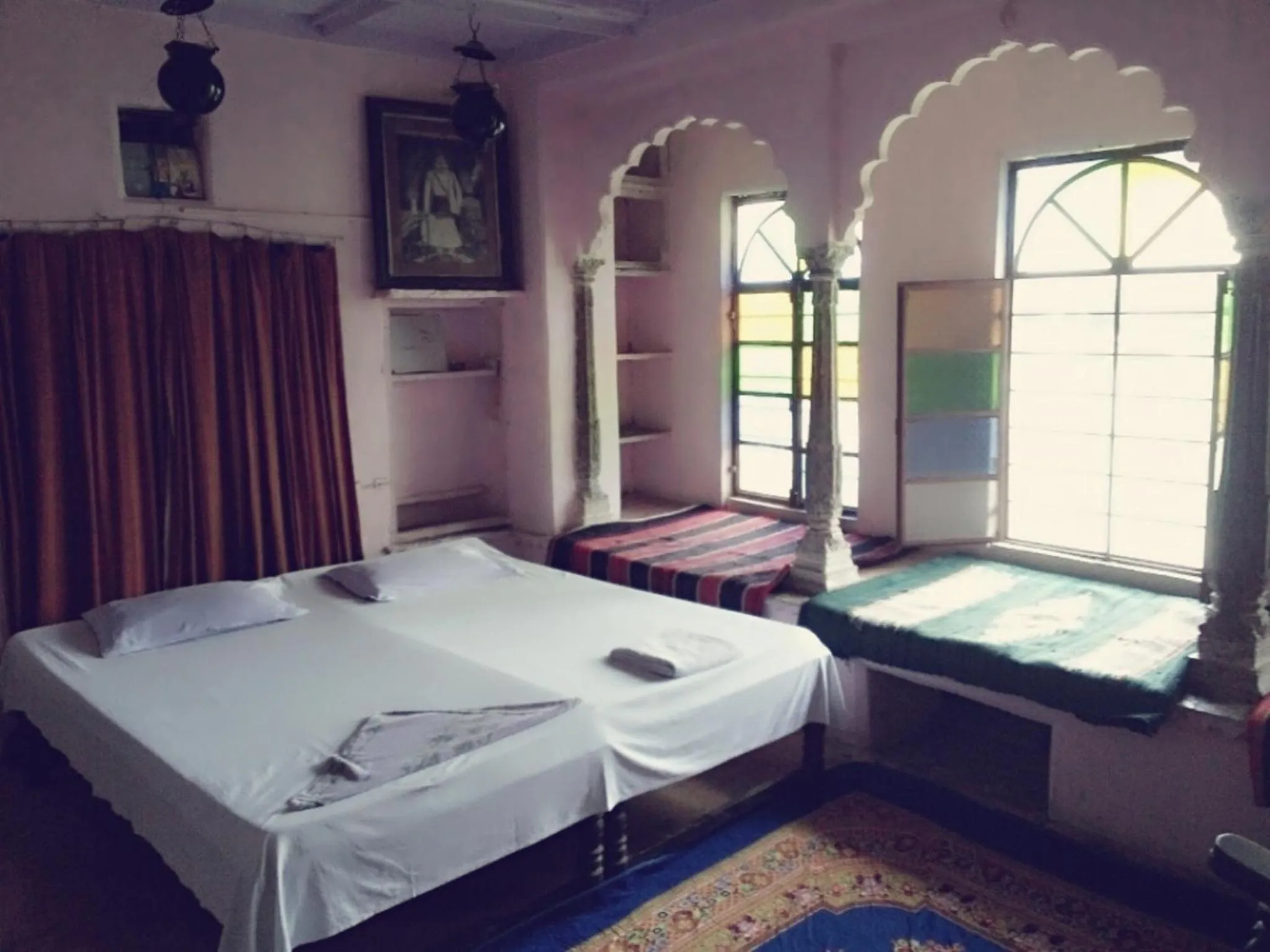Bed in Haveli Uma Megh Tourist Guest House
