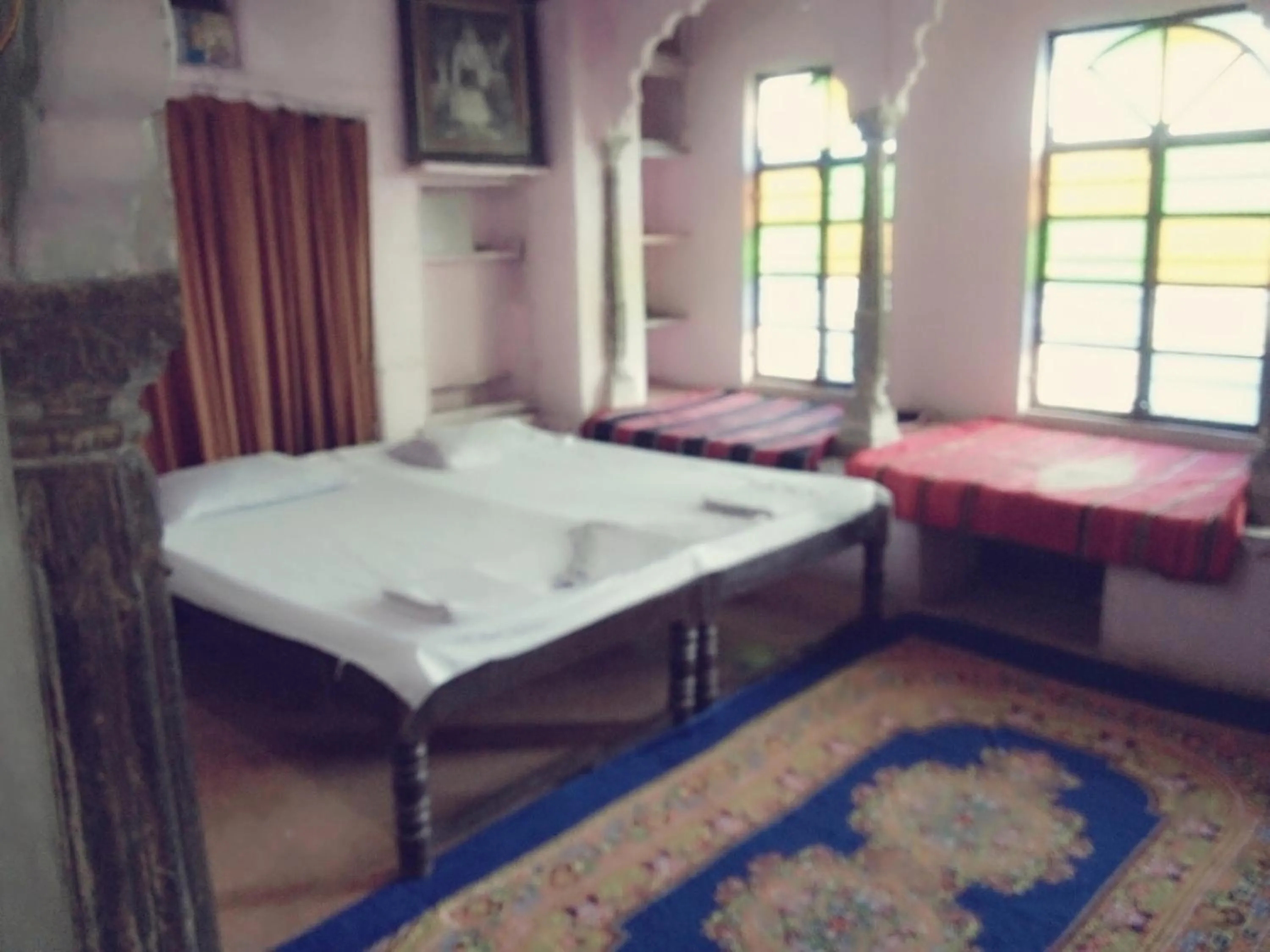 Bed in Haveli Uma Megh Tourist Guest House