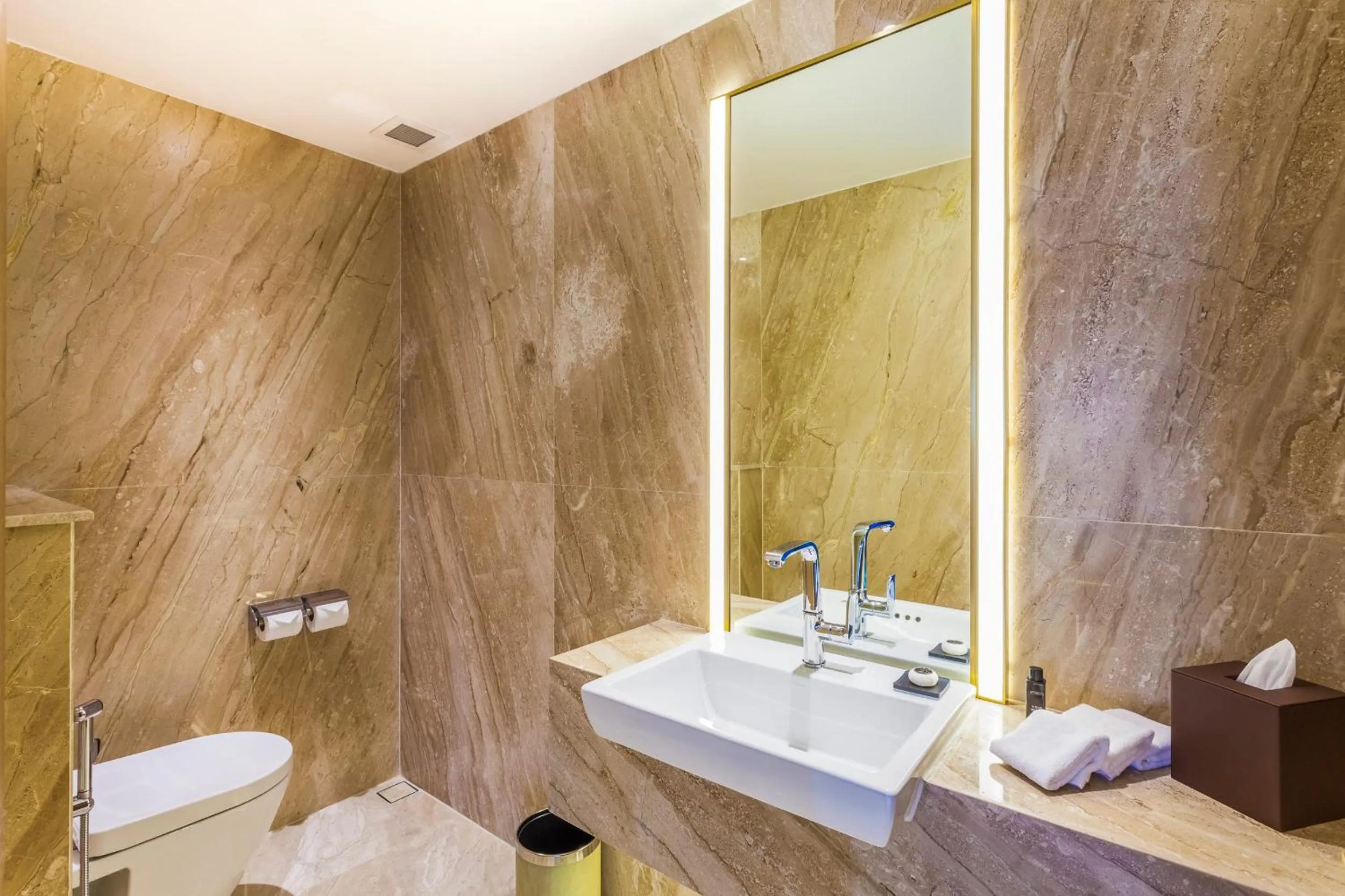 Bathroom in Crowne Plaza Vientiane by IHG