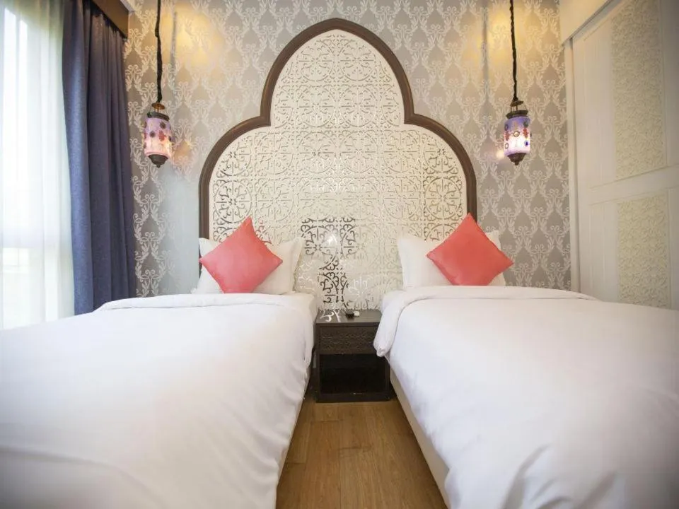 Bed in The Grand Morocc Hotel