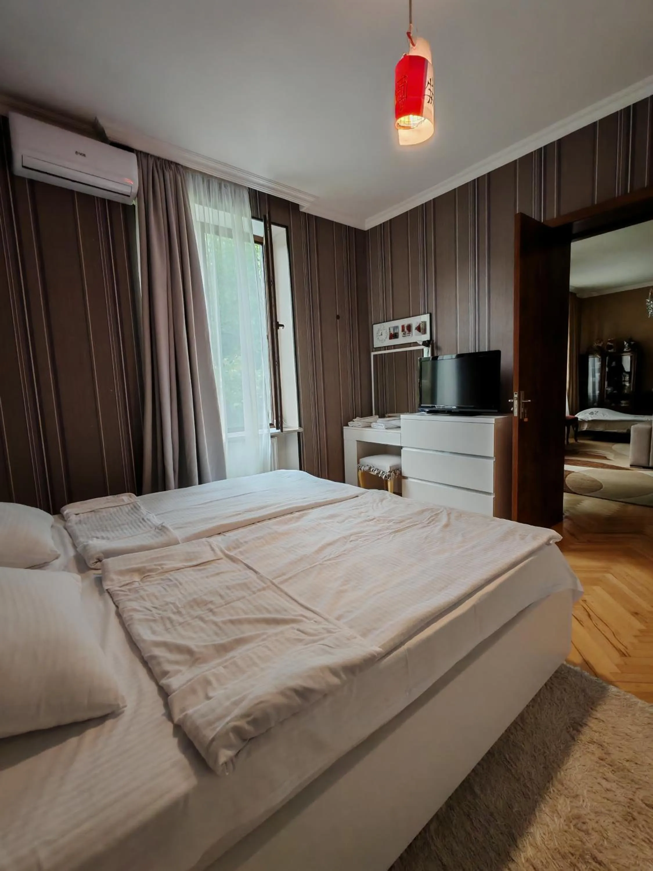 Bed in Qilimcha's Guesthouse-Art Museum