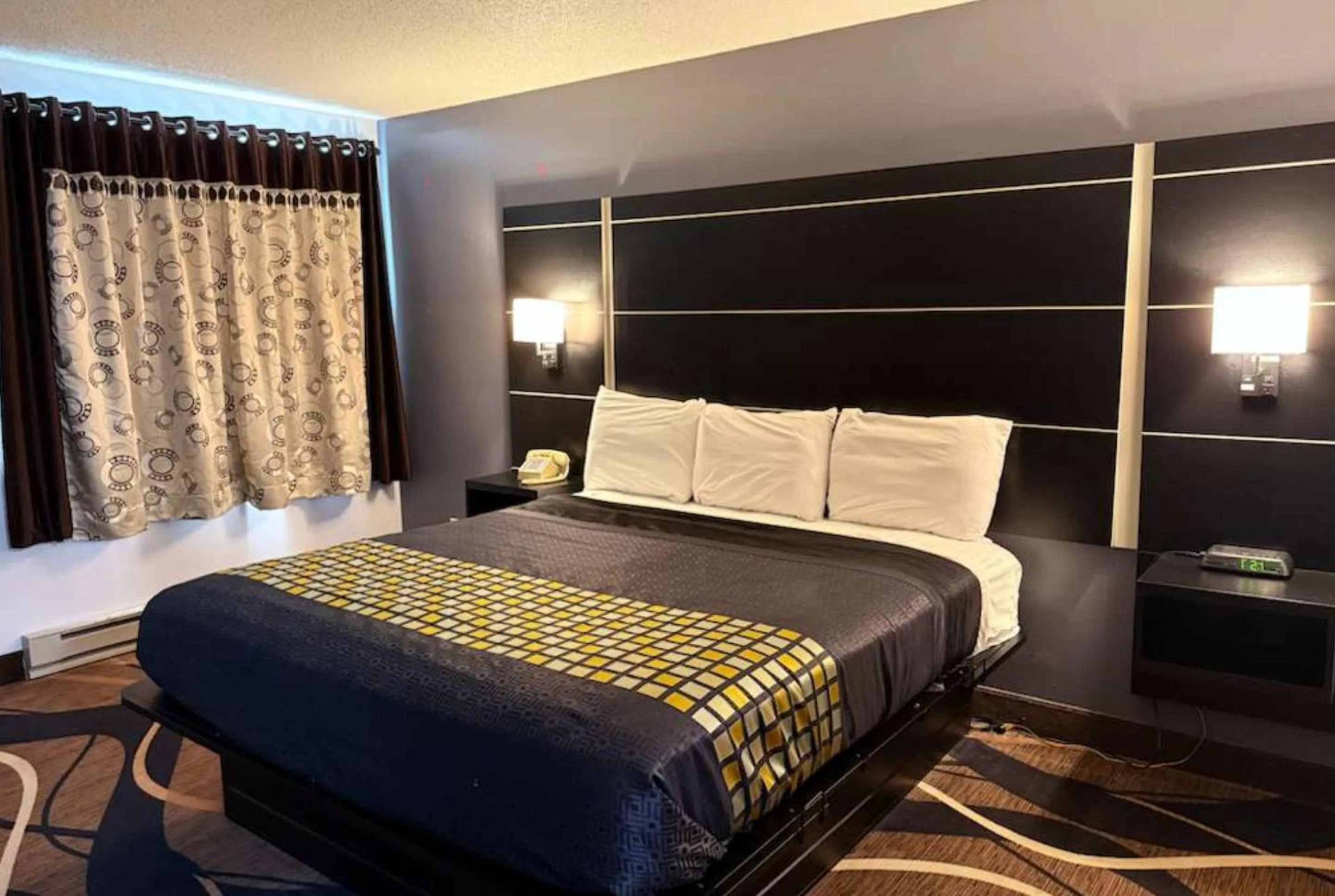 Bedroom, Bed in Coratel Inn & Suites by Jasper Hastings