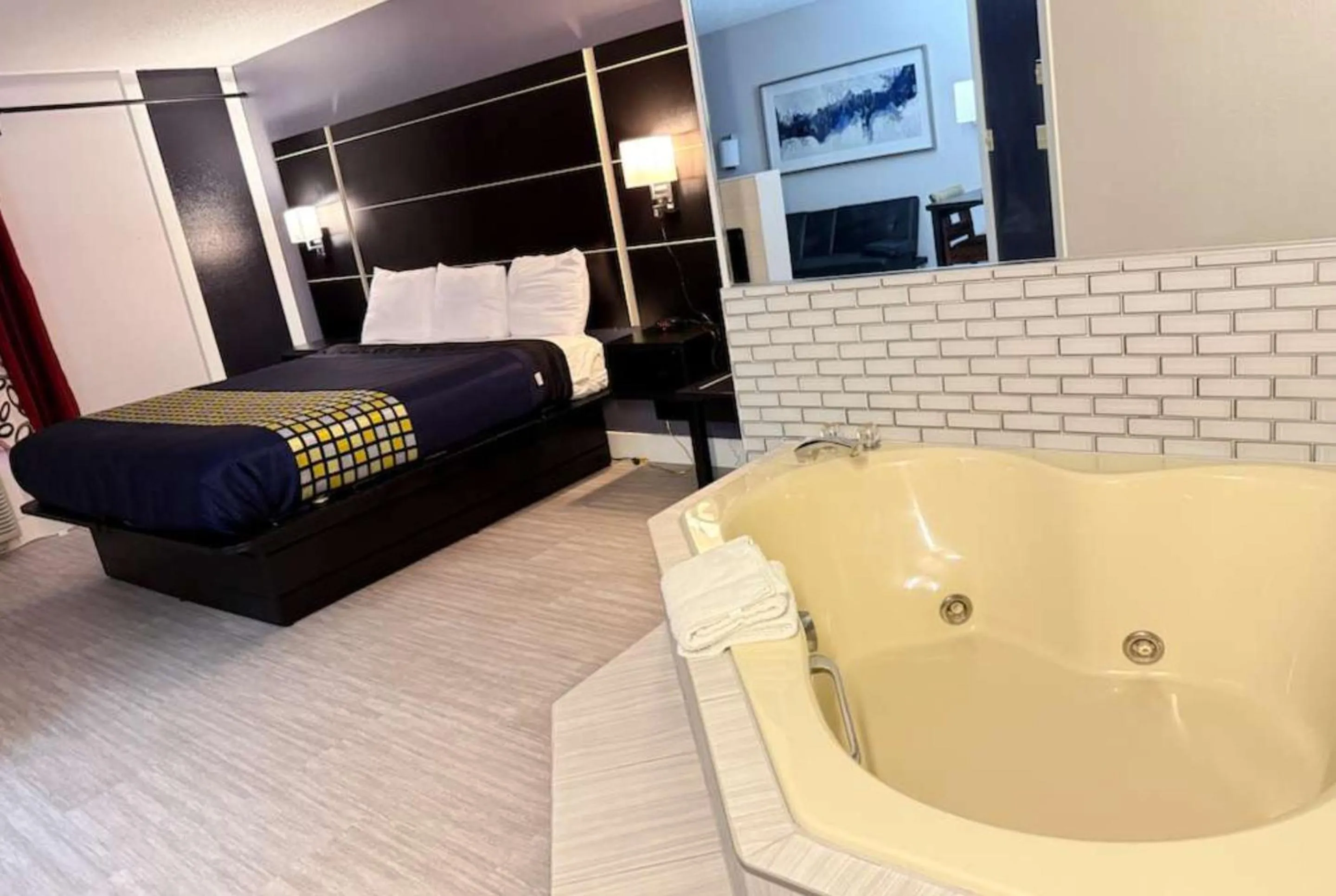 Photo of the whole room, Bed in Coratel Inn & Suites by Jasper Hastings