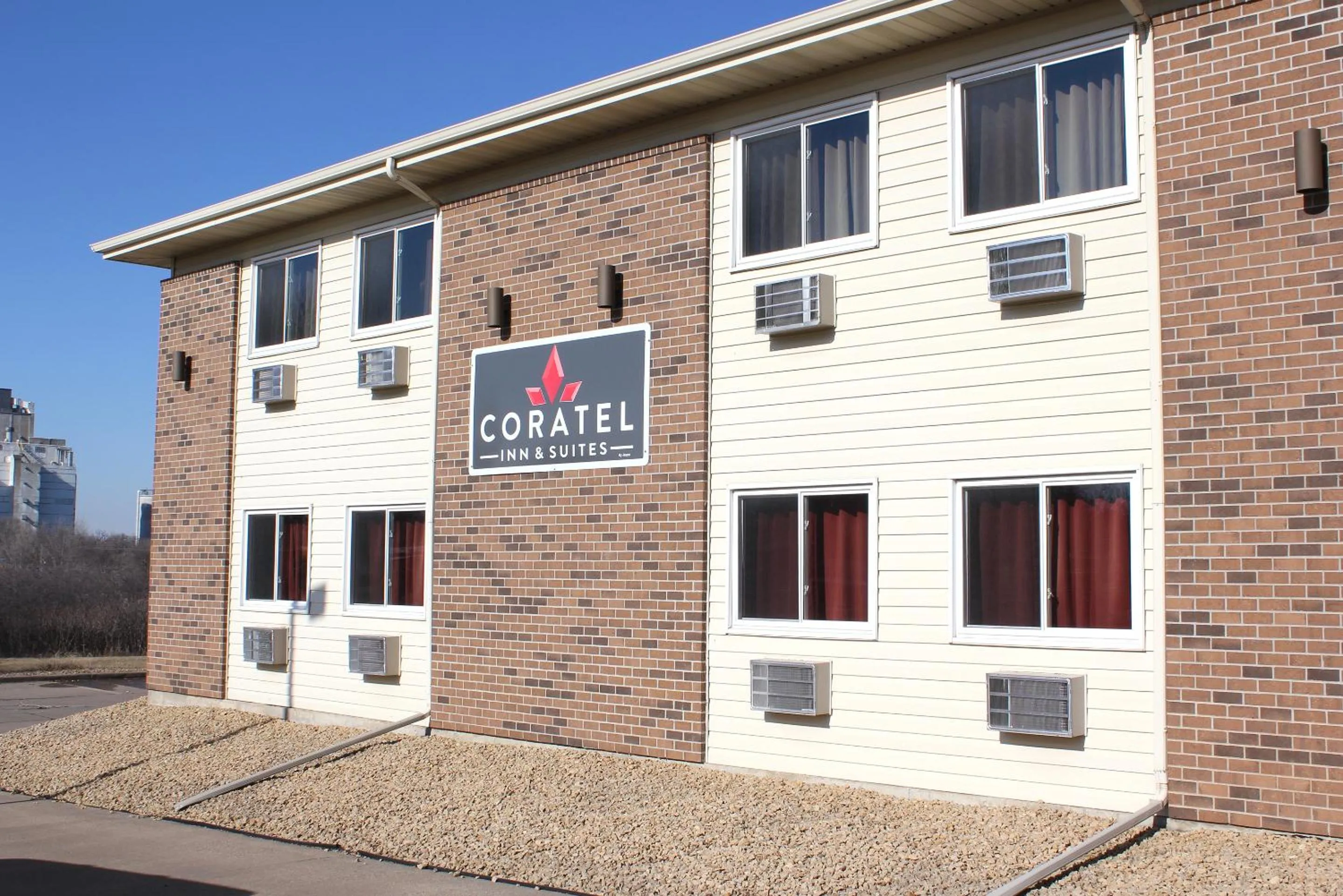 Property building in Coratel Inn & Suites by Jasper Hastings