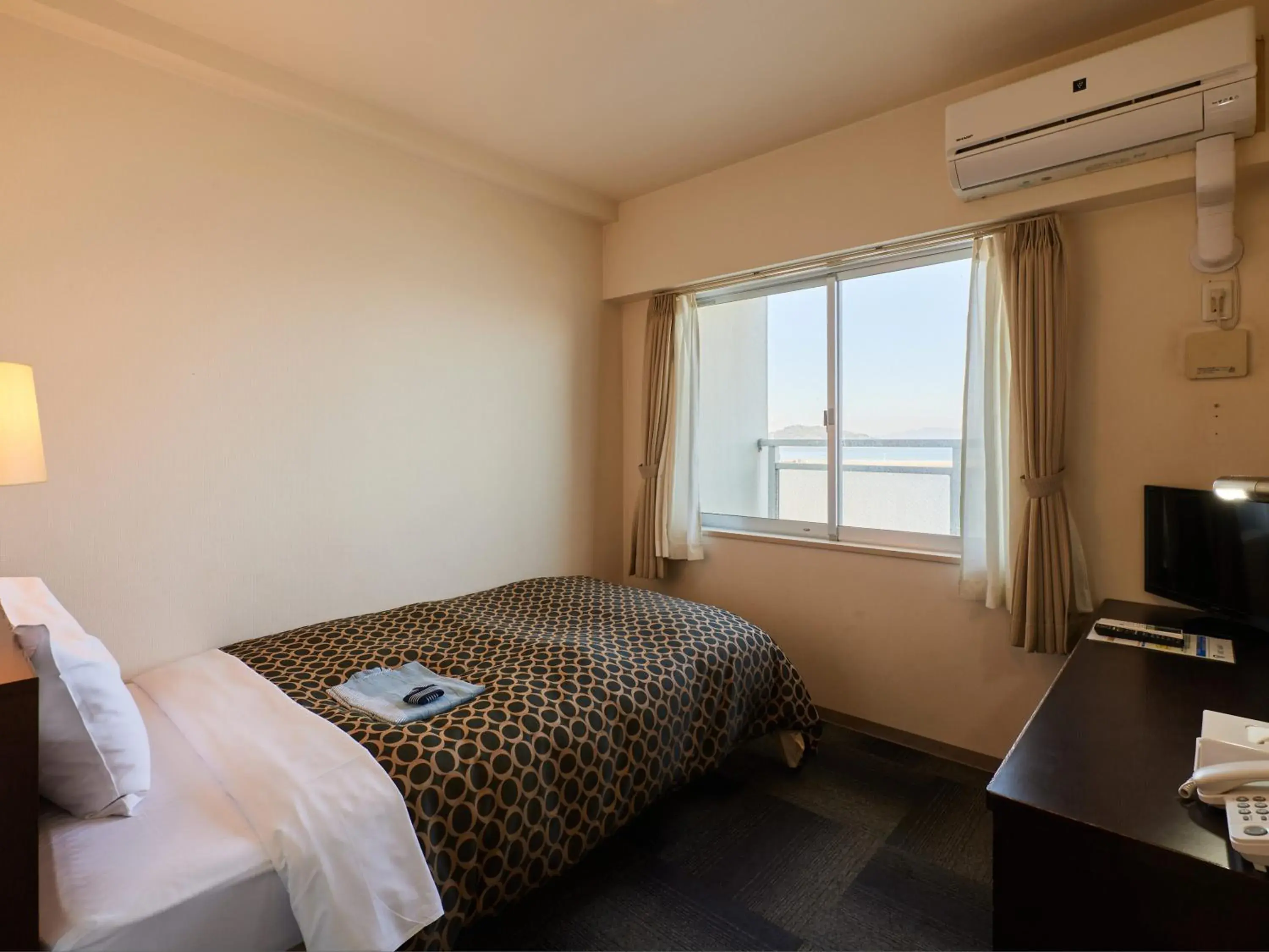 Single Room - single occupancy - Non-Smoking in Wind City Hotel Single Room - single occupancy - Non-Smoking in Wind City Hotel