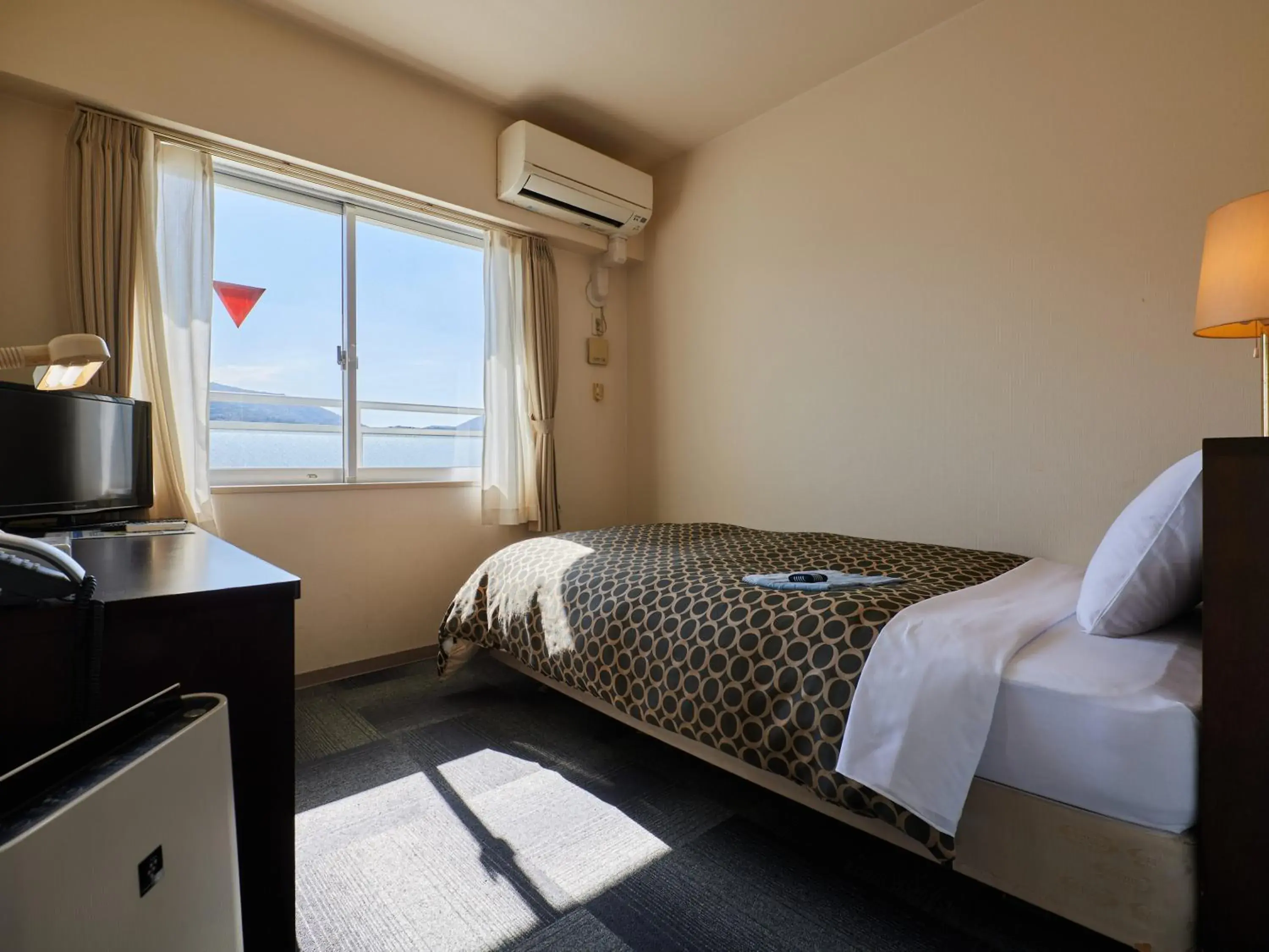 Single Room - Smoking in Wind City Hotel Single Room - Smoking in Wind City Hotel